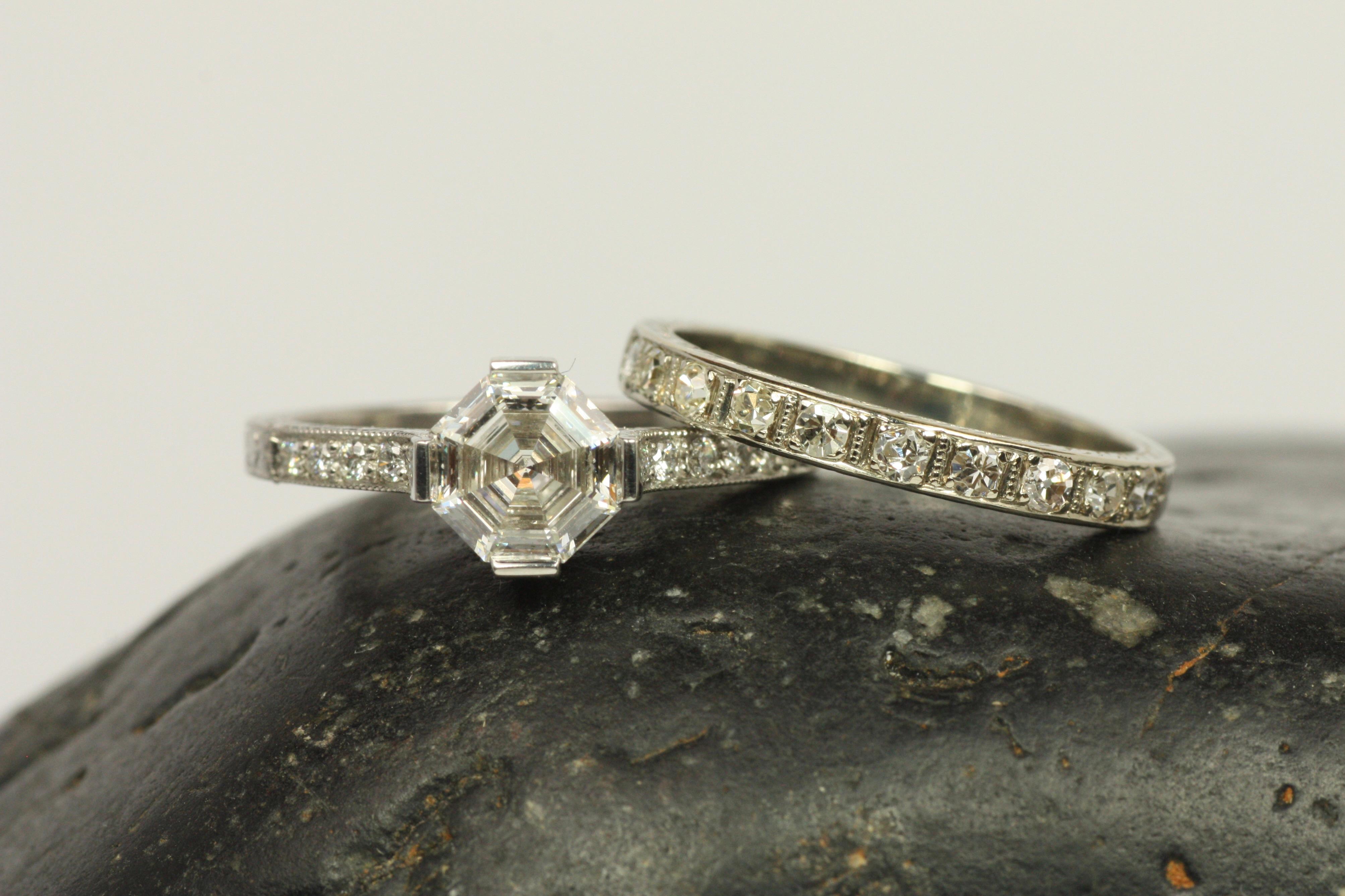 This 18K white gold antique half eternity wedding ring from the 1930s is a beautiful piece from our vintage jewelry collection at Bracken Jewelers in Los Angeles, California. It features 10 diamonds across the top that total 0.20ct. The platinum