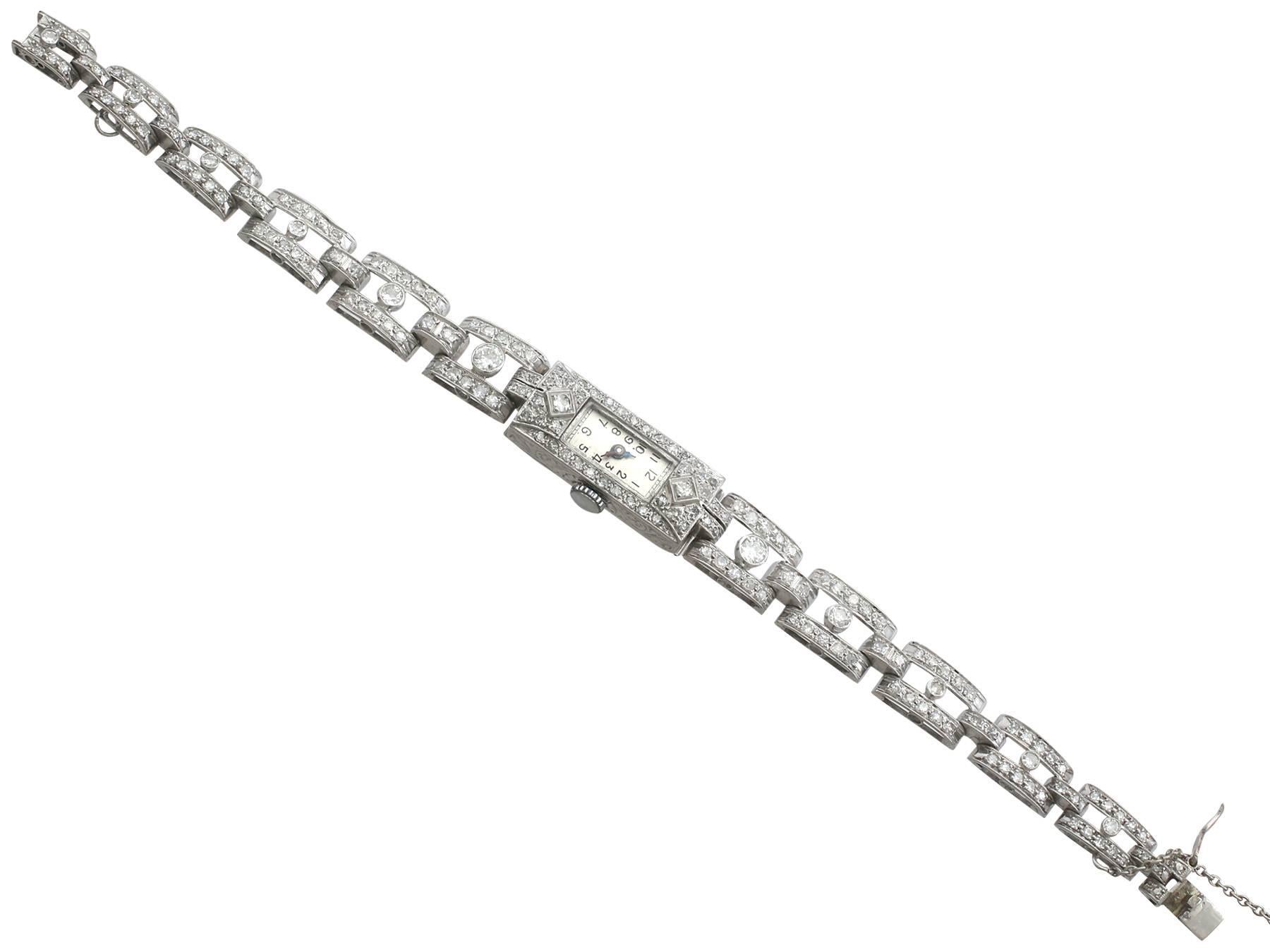 A stunning antique 130's 3.40 Ct diamond and platinum ladies manual wind cocktail watch; part of our diverse antique jewelry and estate jewelry collections.

This stunning, fine and impressive 1930's ladies diamond watch has been crafted in