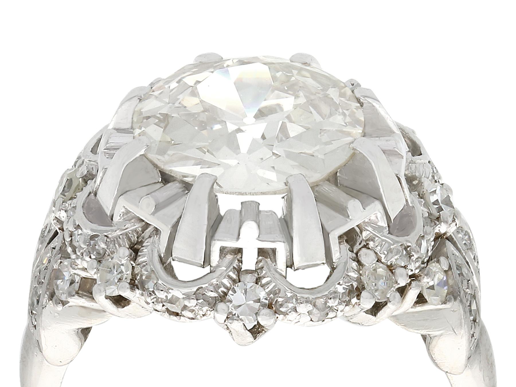 Old European Cut 1930s Antique 4.31 Carat Diamond and Platinum Cluster Ring