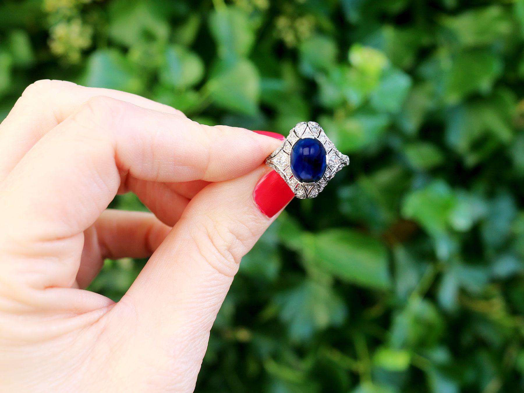 A stunning Art Deco antique 5.21 carat Basaltic sapphire and 0.45 carat diamond, platinum dress ring; part of our diverse antique jewelry and estate jewelry collections.

This stunning, fine and impressive Art Deco cabochon cut sapphire ring has