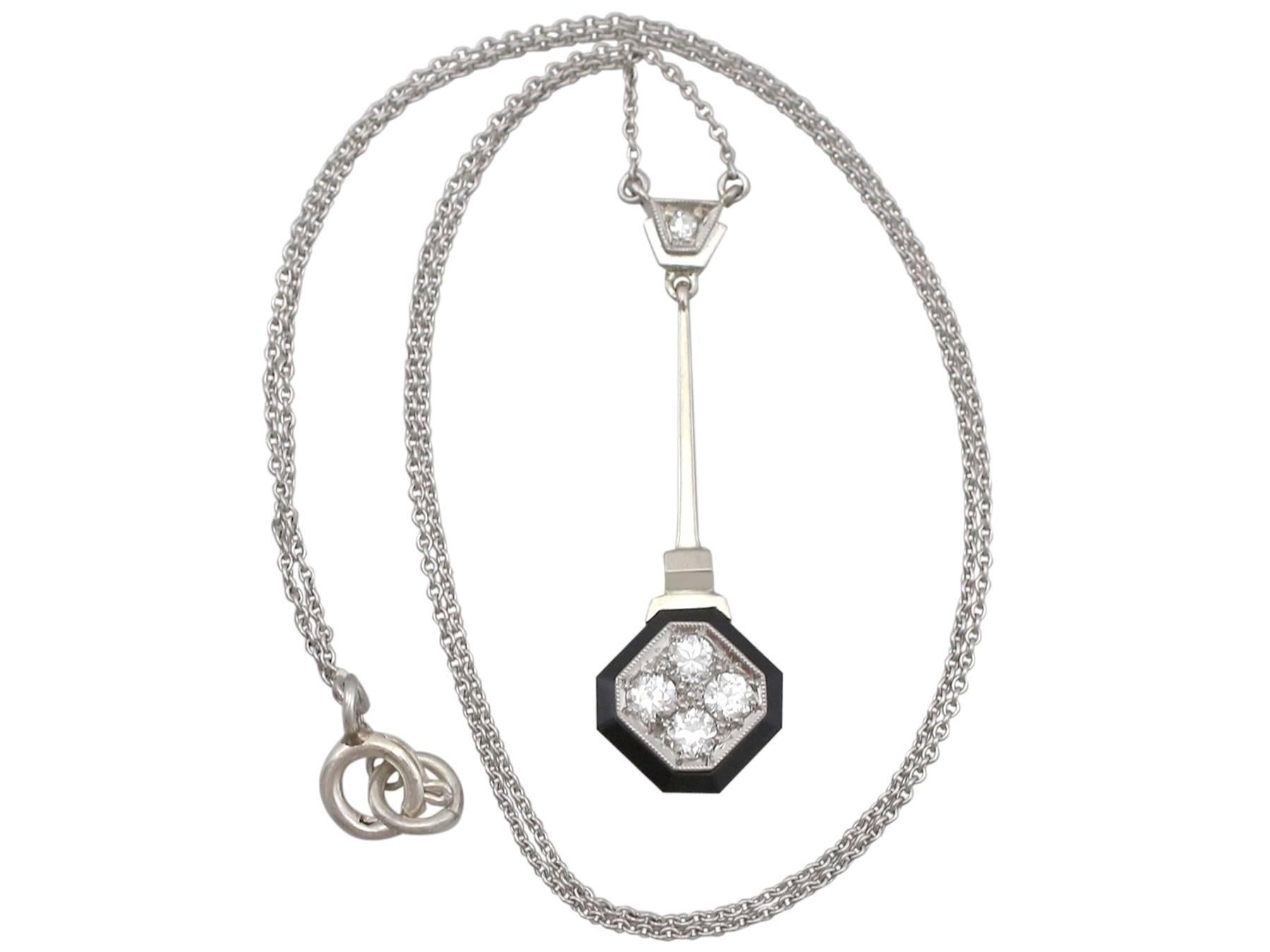 An impressive antique 1930's Art Deco 0.38 Ct diamond and black onyx, 14k white gold necklace; part of our diverse antique jewelery and estate jewelry collections.

This fine and impressive diamond and onyx necklace has been crafted in 14k white