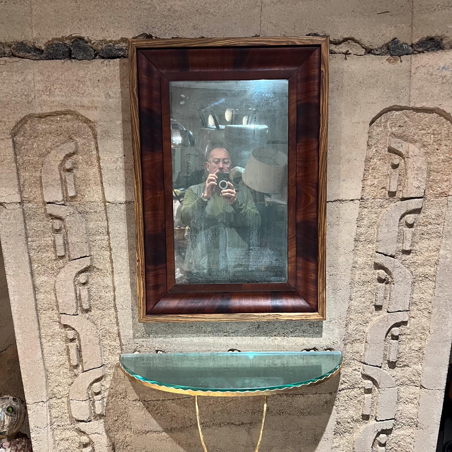 AMBIANIC presents
1930s Antique Art Deco Walnut and Zebra Wood Wall Mirror
Vintage Patina and Oxidation Present. Expect vintage wear and use.
35.25 h x 24 w x 1.75 d
Upgraded wood frame.
Original preowned vintage condition.
Refer to Images.
LA OC PS