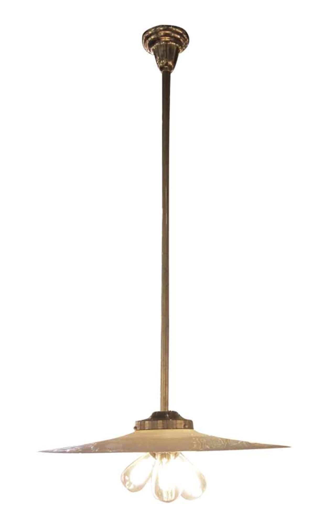 1930s three socket Industrial Benjamin rewired pendant light and new brass fitter, pole and canopy. Even though it's from the Industrial Era it has a certain Mid-Century Modern look. This light is wired and ready to ship. Please note, this item is