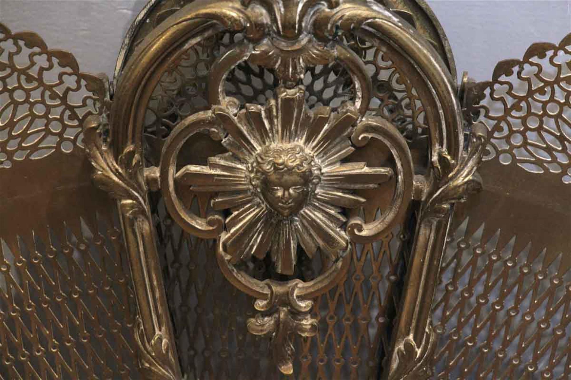 1930s polished brass fireplace fan screen with figural and decorative details. In excellent condition. This can be seen at our 5 East 16th St location on Union Square in Manhattan.
