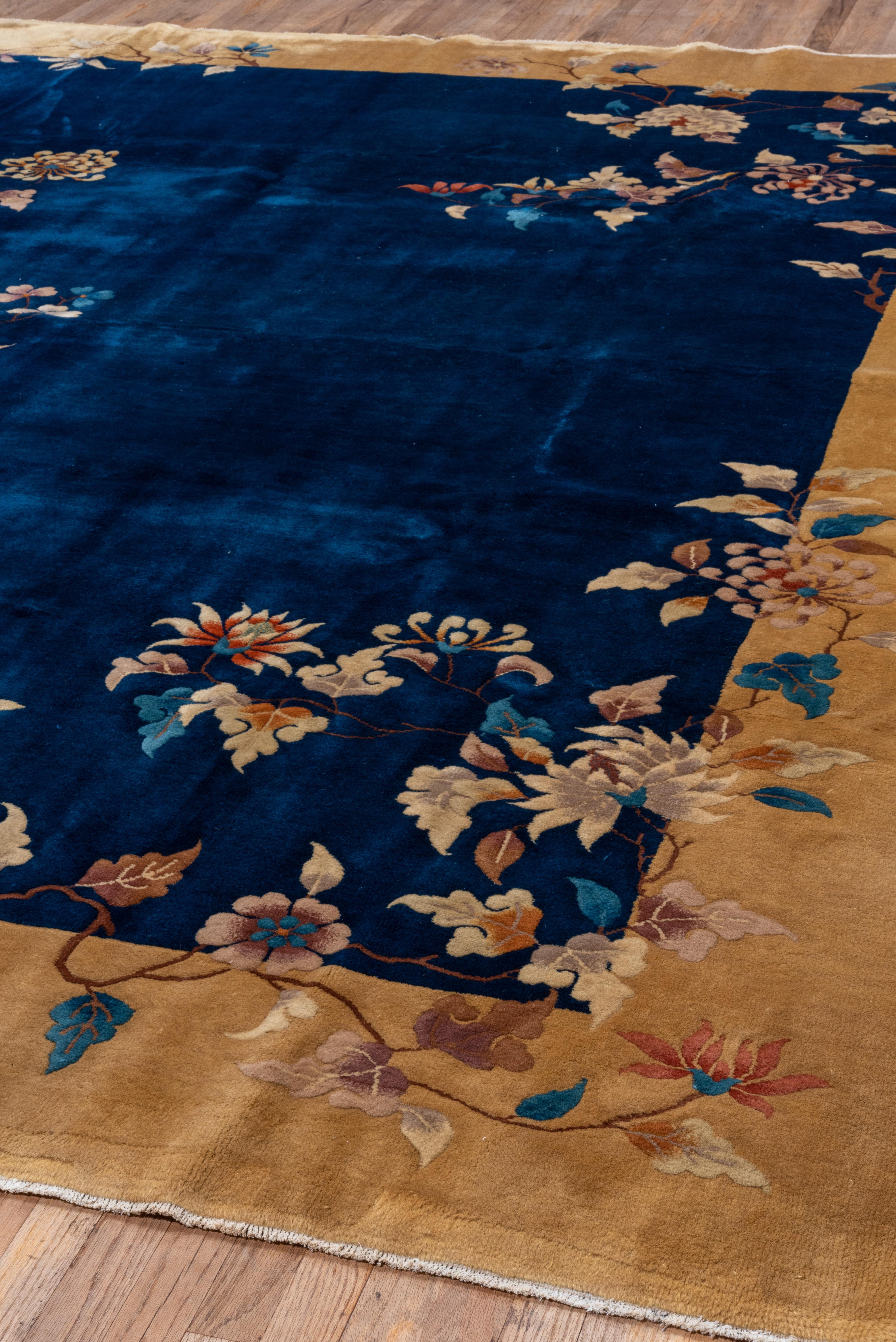 1930s Antique Chinese Art Deco Peking Rug, Navy Field, Gold Borders In Good Condition For Sale In New York, NY