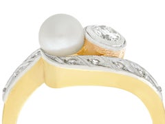 1930s 0.37 Carat Diamond and Pearl 14K Yellow Gold Twist Ring