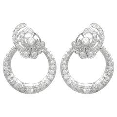 Orecchini circolari in platino e diamanti antichi del 1930