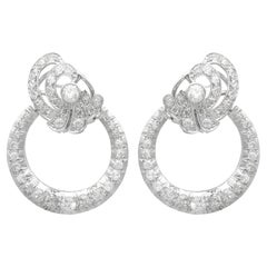 Orecchini circolari in platino e diamanti antichi del 1930