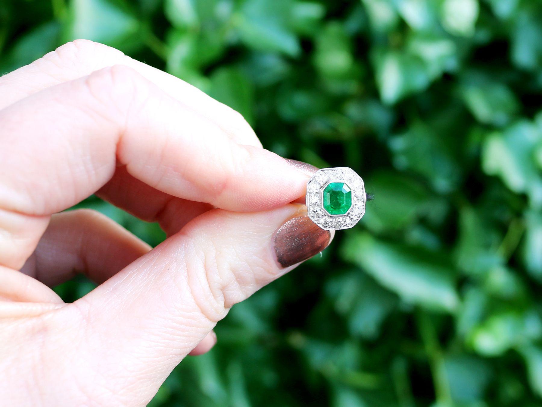 A fine and impressive 0.91 carat emerald and 0.84 carat diamond dress ring crafted in 14 karat white gold; an addition to our antique jewelry collections.

This fine and impressive antique emerald ring has been crafted in 14k white gold.

The
