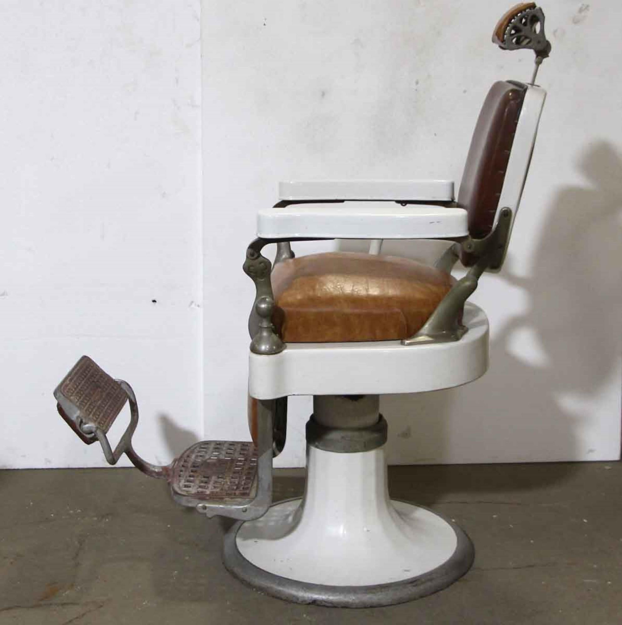 1930s Antique Emil J Paider Brown Barber Chair with Leather and Vinyl Upholstery In Good Condition In New York, NY