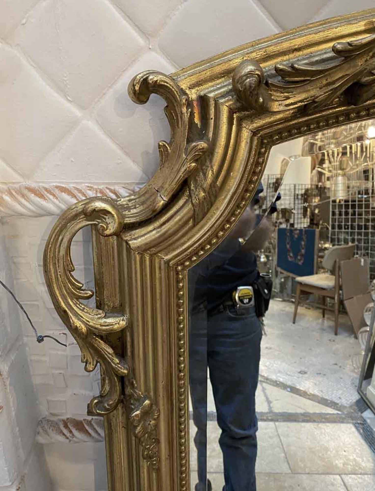 1930s Antique French Rococo Gilded Wall Mirror with Bevels; Hand Carved In Good Condition In New York, NY