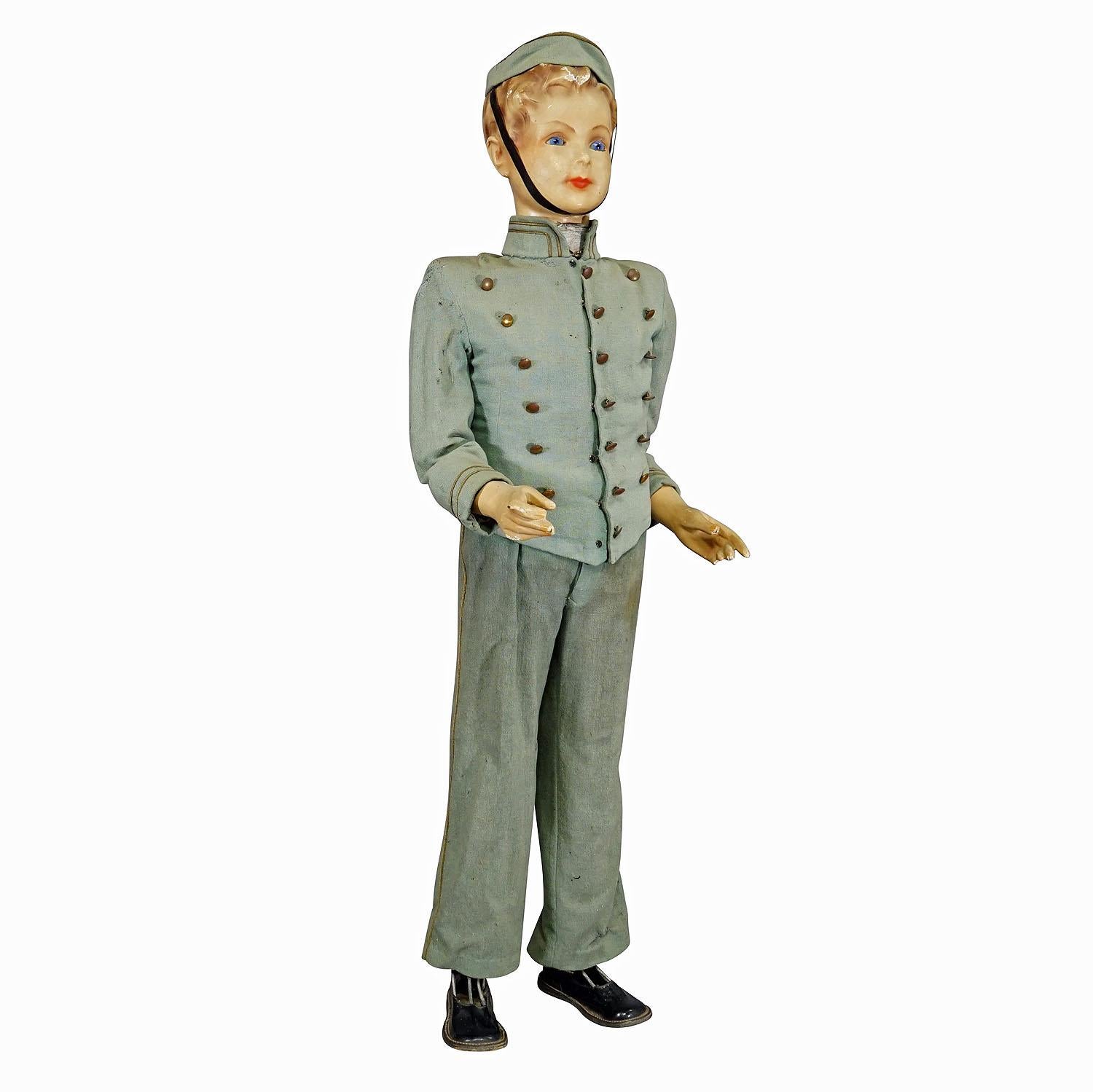 1930s Antique Hotel Page Automaton

An antique hotel page automaton manufactured by P. Stokvis, Den-Haag - Netherlands ca. 1930s. A young boy in hotel page costume made of paper-mâché, wood, iron, canvas and glass eyes. He is moving his head and the