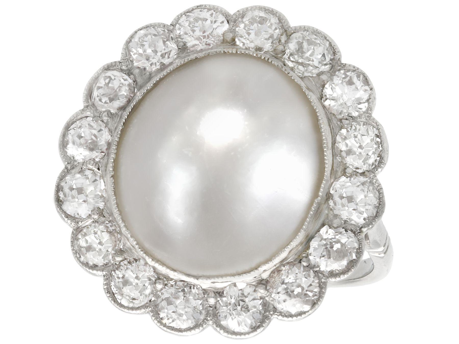 A stunning antique 1930s mabe pearl and 1.90 carat diamond, platinum cluster style dress ring; part of our diverse antique jewelry and estate jewelry collections.

This stunning, fine and impressive mabe pearl ring with diamonds has been crafted in