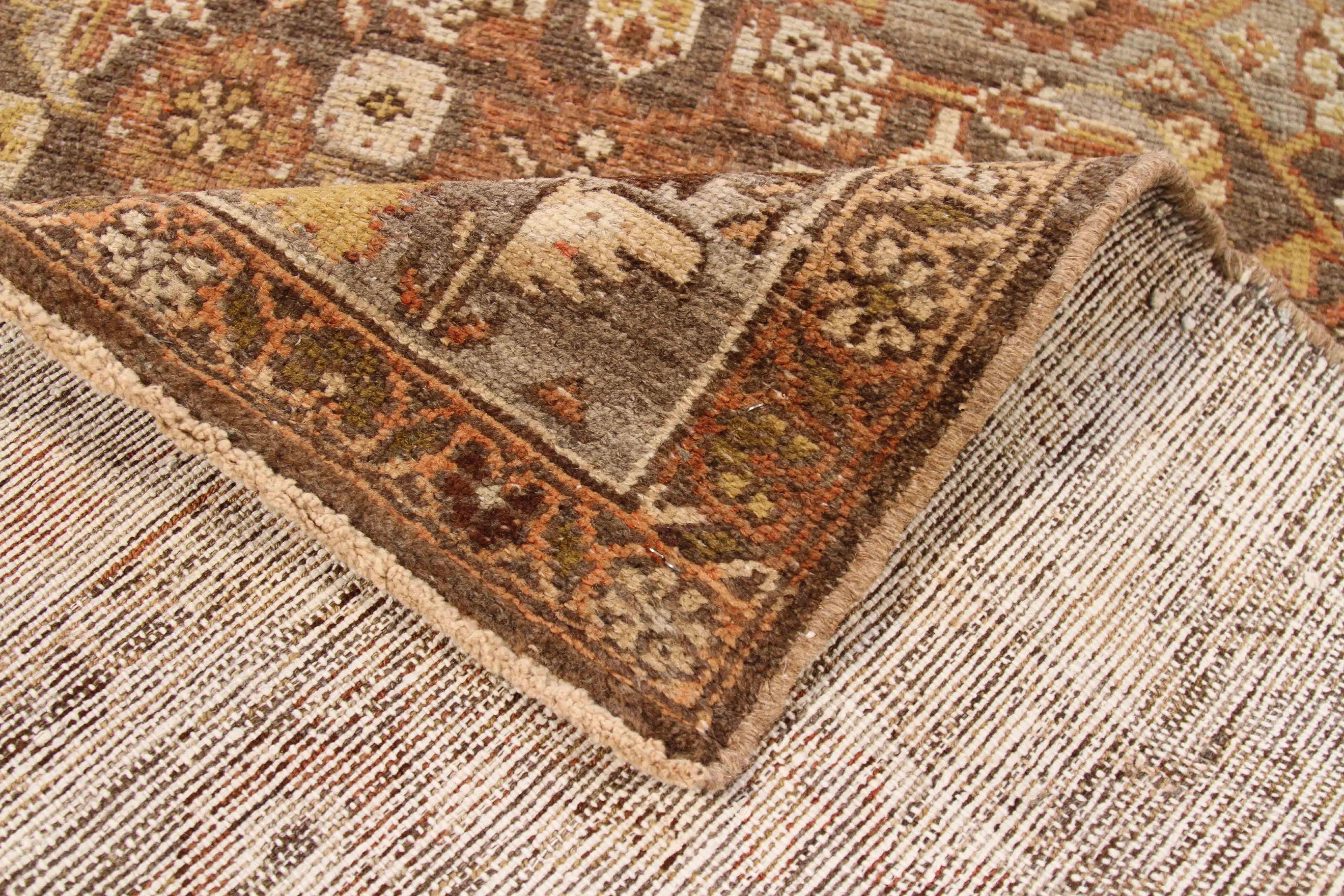 Made from high-quality wool and natural dyes, this antique Persian rug has a rustic feel brought about by its tribal-inspired patterns. It matches well with the chosen color mix of brown, beige, red and yellow. This piece will look stunning in a