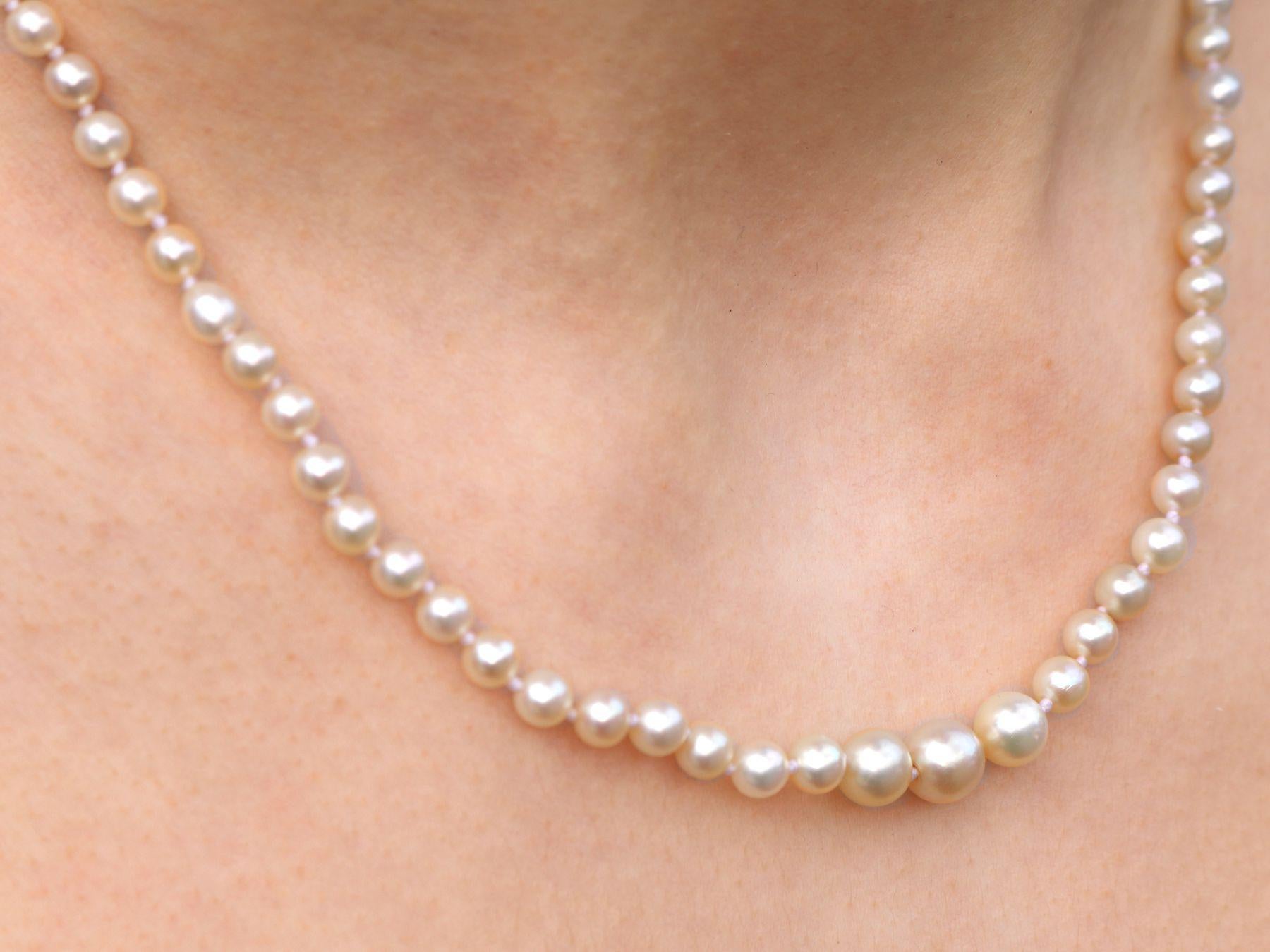 Women's or Men's 1930s Antique Single Strand Natural Pearl Necklace with Diamond Set Clasp