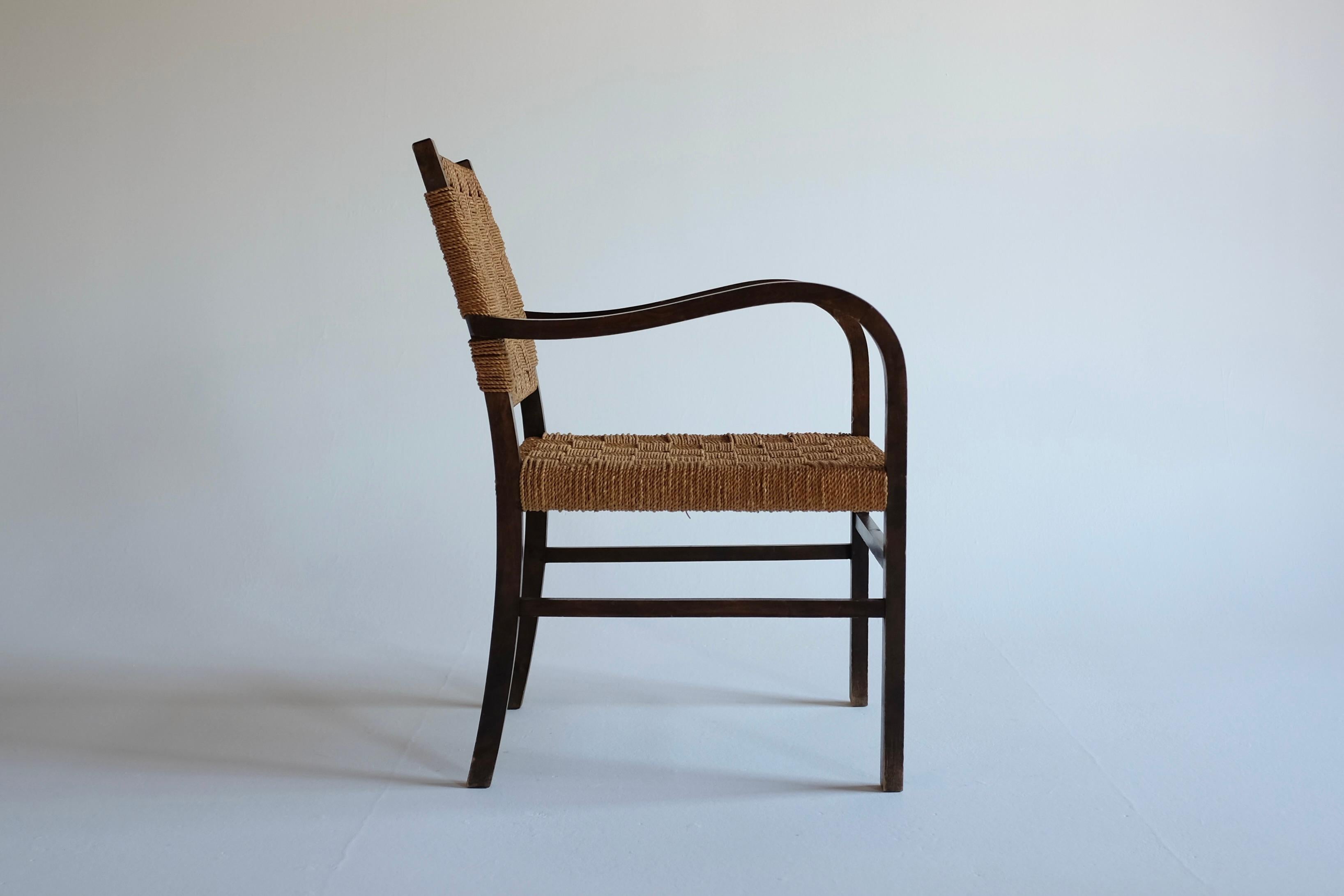 Beautiful Cord and Birch armchair by Axel Larsson for SMF Bodafors, Sweden. Designed in the 1930s the design is typical for the functionalism that dominated Swedish design at the time with simple yet elegant design. The twisted paper cord shows a