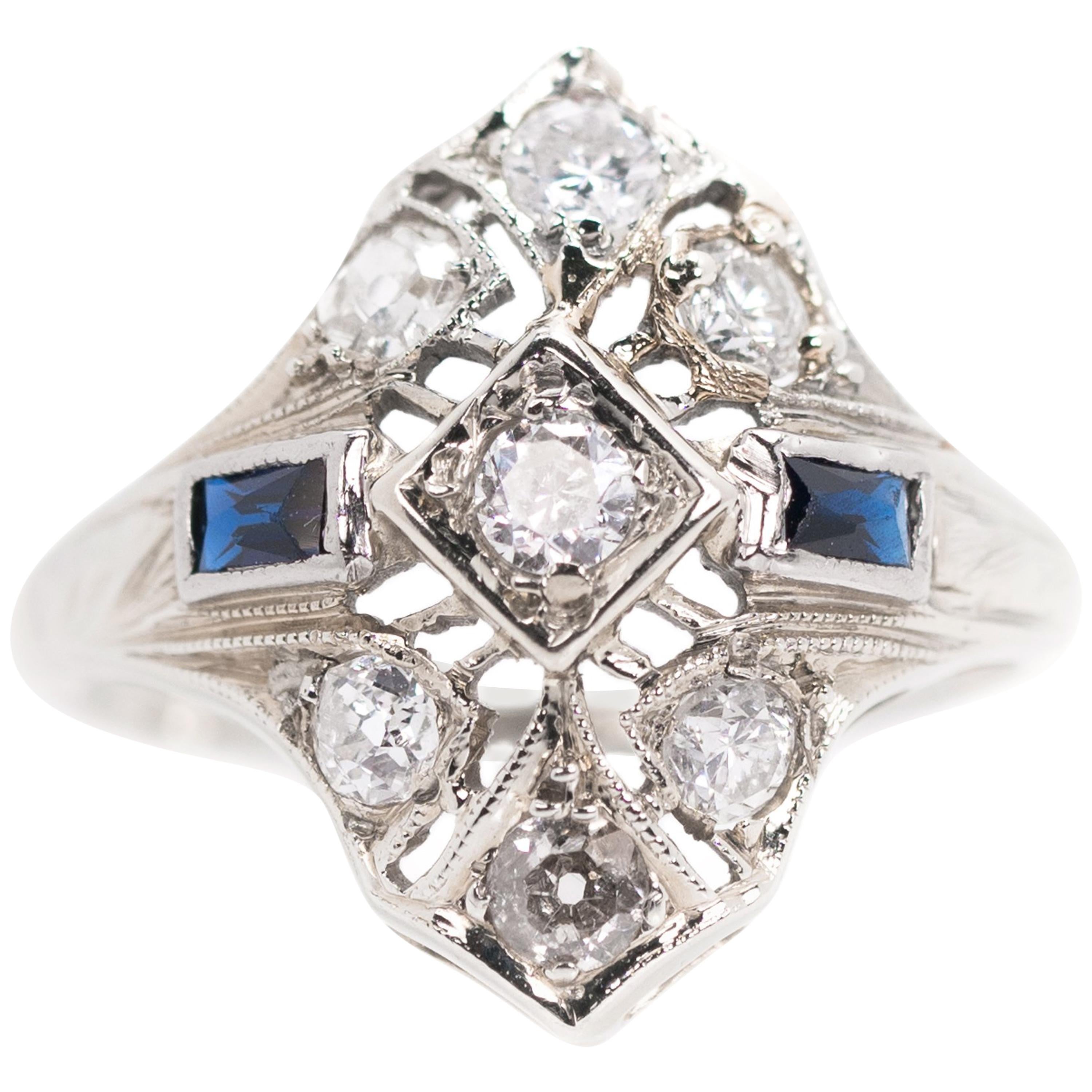 1930s Art Deco 0.25 Carat Diamond and Sapphire Platinum Engagement Ring