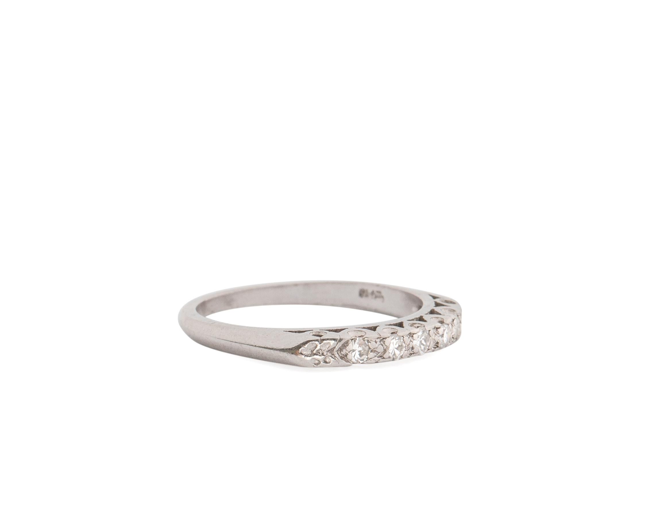 Item Details:
Metal type: 14 Karat White Gold
Weight: 2.5 grams
Fits Ring Size 5 

Diamond Details: 
Cut: Single Cut
Carat: .15 Carats
Color: F
Clarity: VS

Ring Features:
Made in 1930s, Art Deco Era
Fits Ring Size 5
Simplistic ring band design