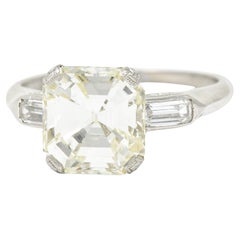 1930
s Art Deco 3.32 Carats Emerald Step Cut Platinum Floral Engagement Ring GI