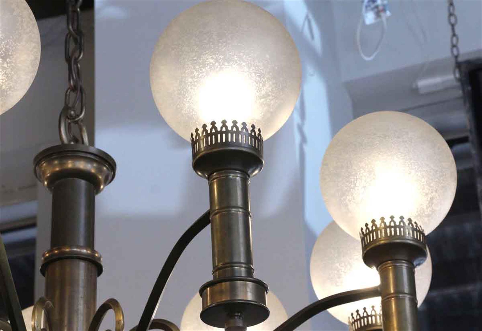 American 1930s Art Deco 9 Globe Brass Chandelier with Round Textured Globes