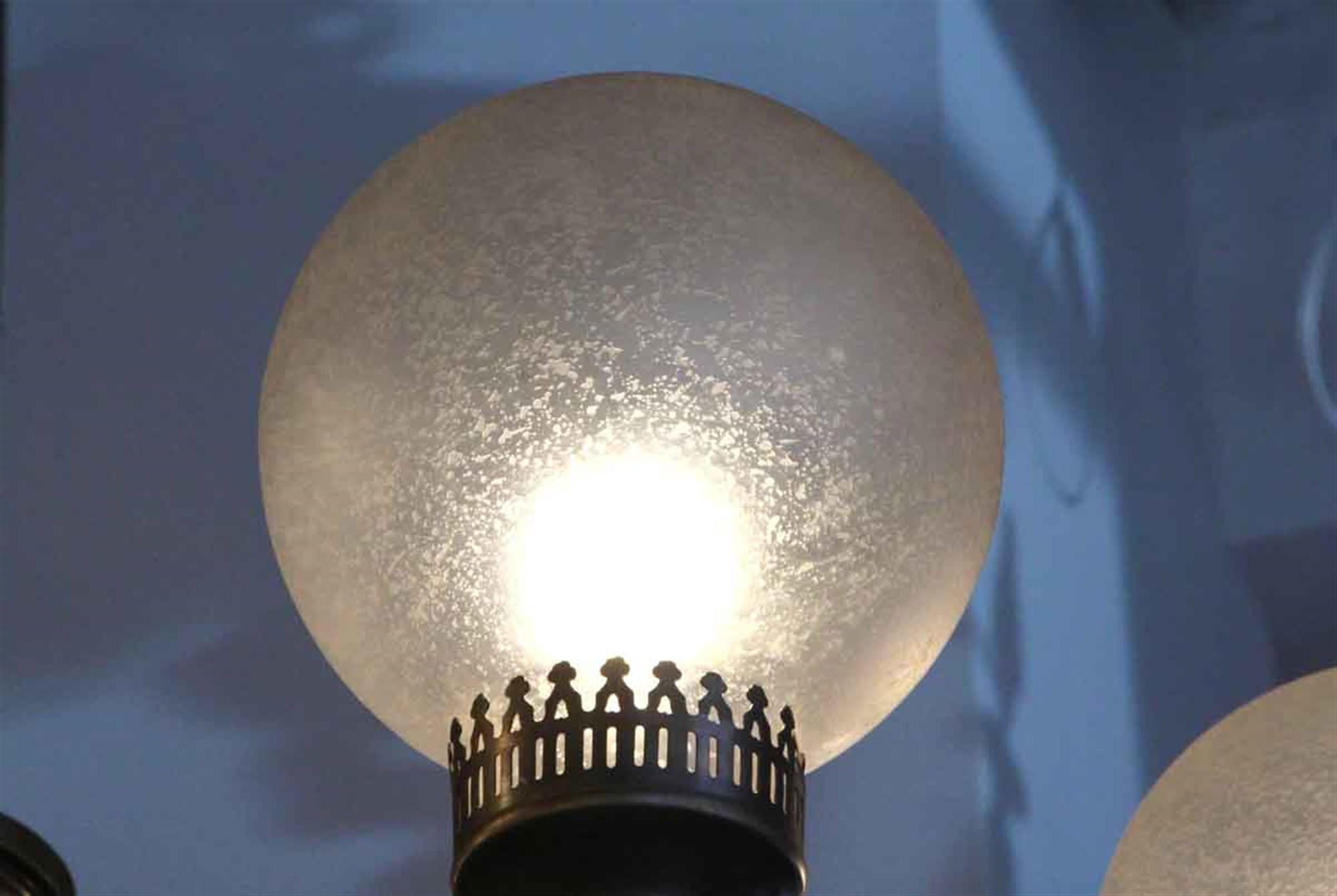 1930s Art Deco 9 Globe Brass Chandelier with Round Textured Globes In Good Condition In New York, NY