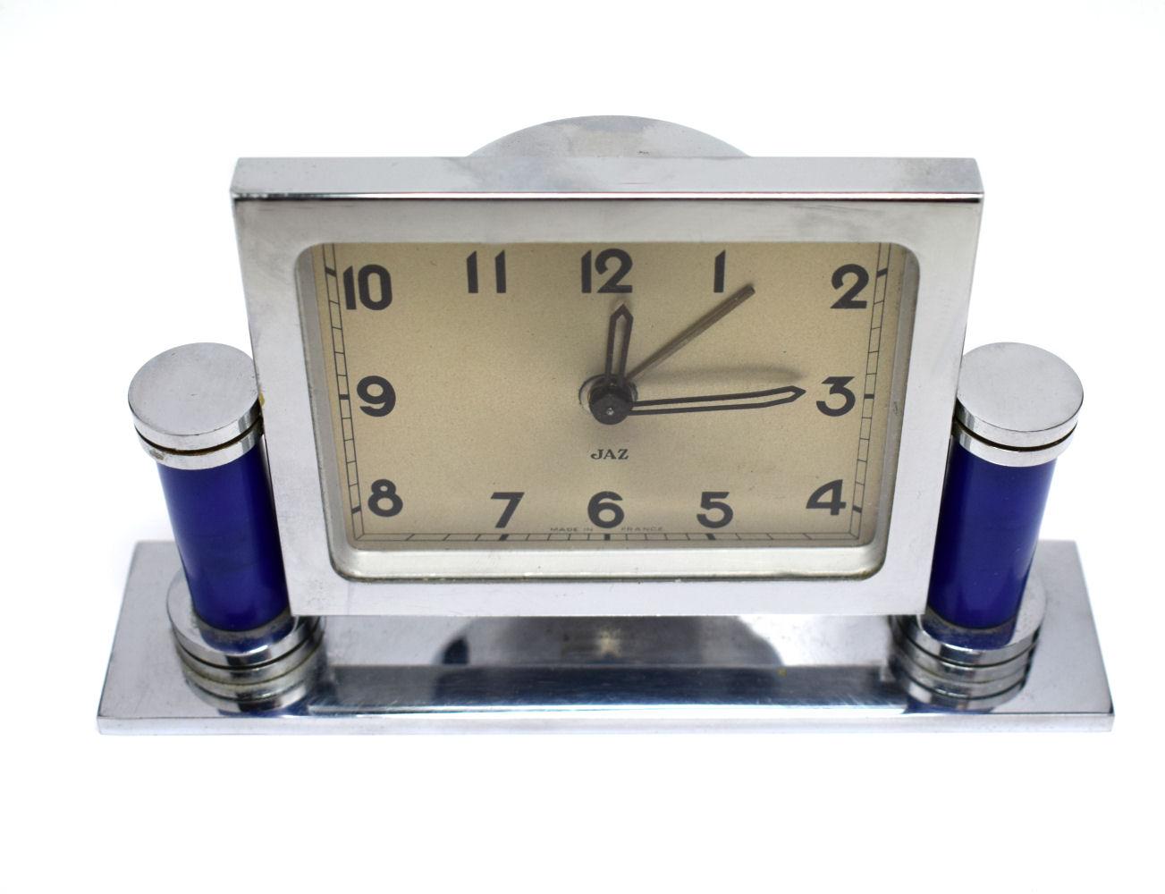 Very stylish 1930s French Art Deco clock by the clock makers JAZ. All chrome casing and plinth with two royal blue pillars. Very good condition overall with only minor signs of age as one would expect from a clock from this era. Quite a weighty