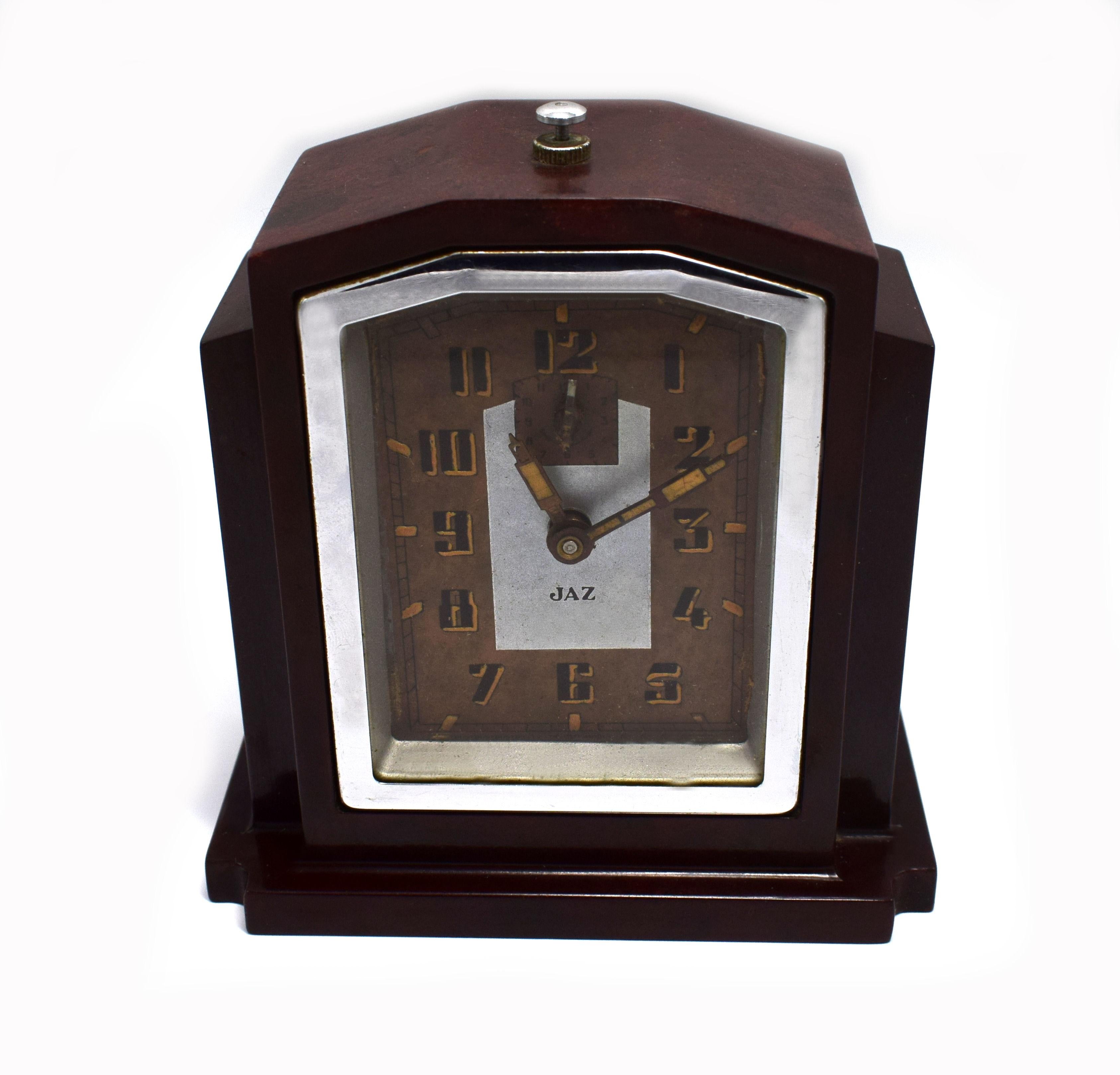 Fabulous 1930s Art Deco clock by JAZ a French clock maker. This clock is in a deep cherry red with black speckles and wonderful skyscraper shaped casing. The condition of the face is particularly good showing little to no signs of it's true age. The
