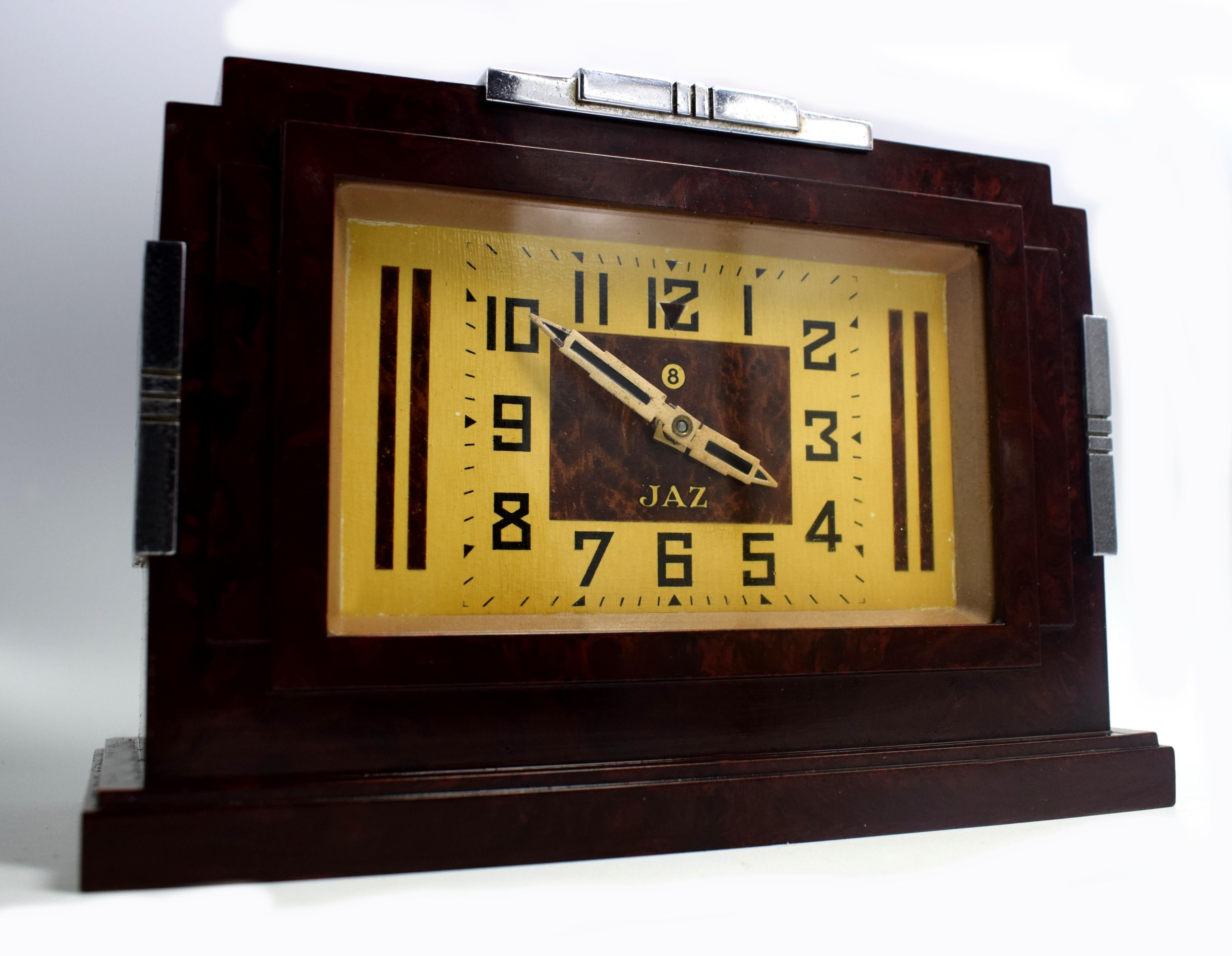 This is one of the daddies of JAZ Bakelite clocks 1930s . Made in France by the very collectable JAZ company, this clock screams everything about the Deco era we all love and admire, Industrial and modernist. The casing is a mottled deep red color,