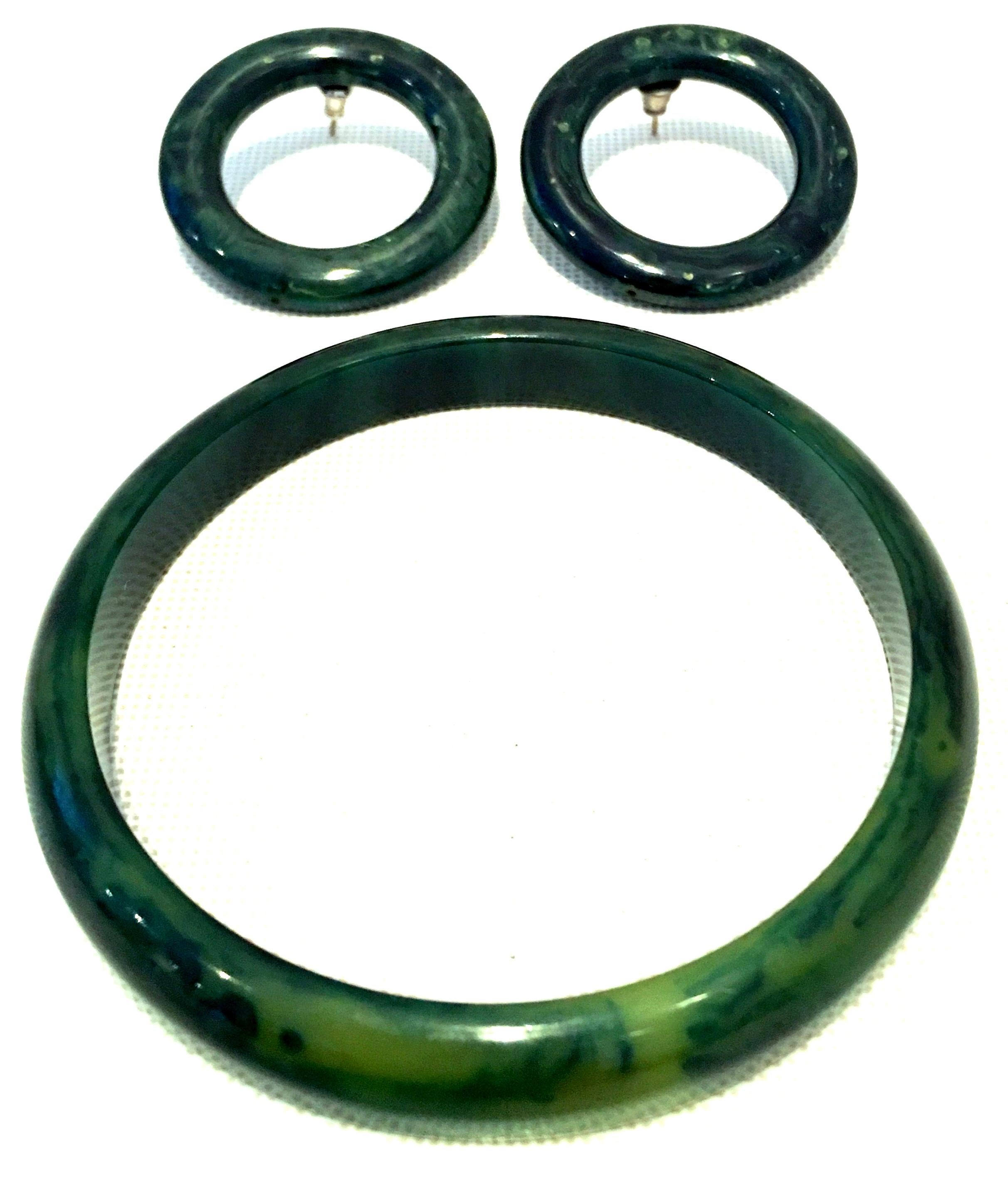 1930'S Art Deco Bakelite Green Bangle Bracelet & Hoop Earrings. The three piece set 
features marbleized hunter green bangle bracelet and pierced hoop earrings with silver mountings.
The hoop earring are 1.25