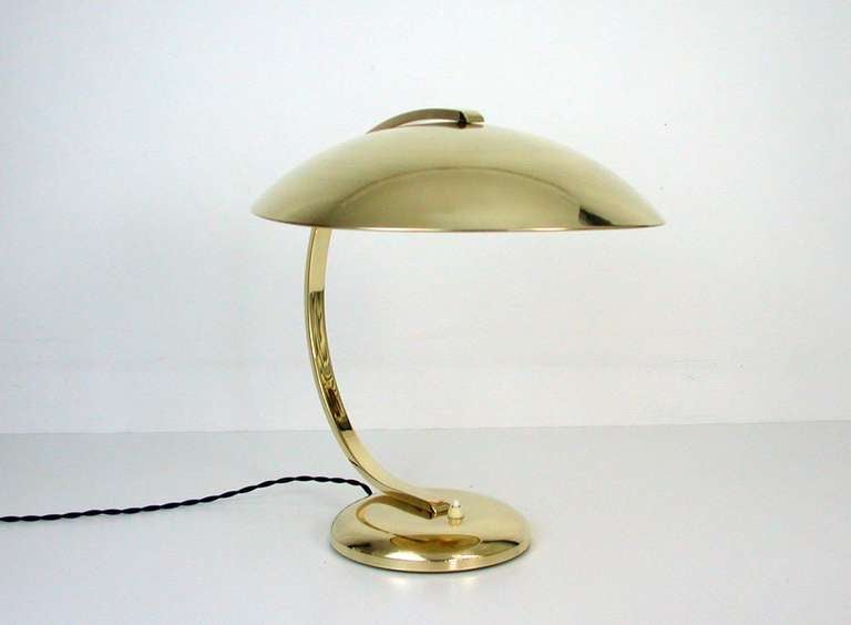 Beautiful large original Hillebrand brass desk lamp, made in Germany, 1930s. Excellent clean and polished condition. Typical streamline design and heavy quality. 

The lamp works with an E27 Edison screw on bulb on 220V as well as 110V. It has