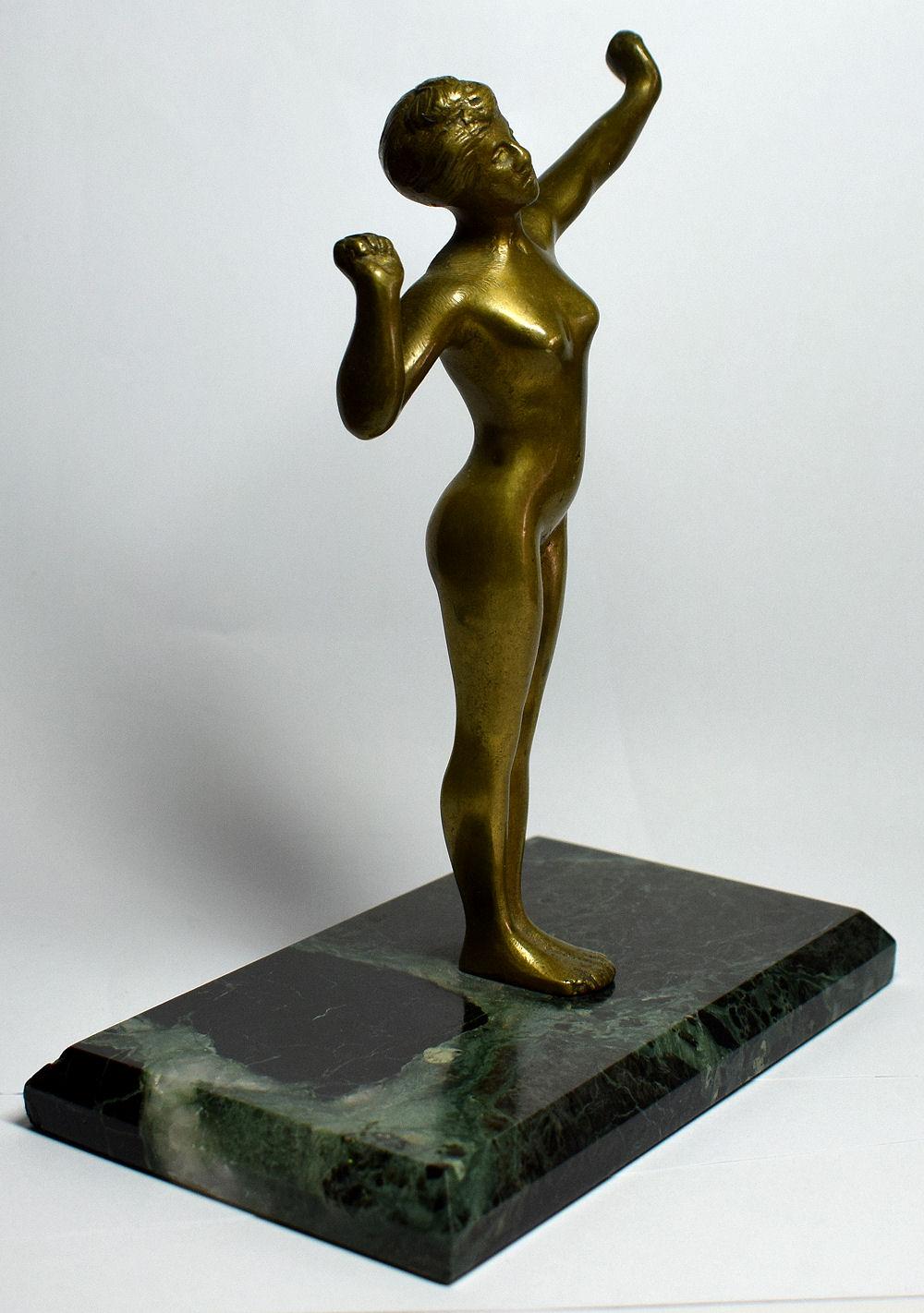 For your consideration is this wonderful Art Deco female figure made from brass and lacquered on top. She rests on an marble base and stands 18 cm tall so a good height for display. Beautifully detailed and good condition, all fingers and toes are