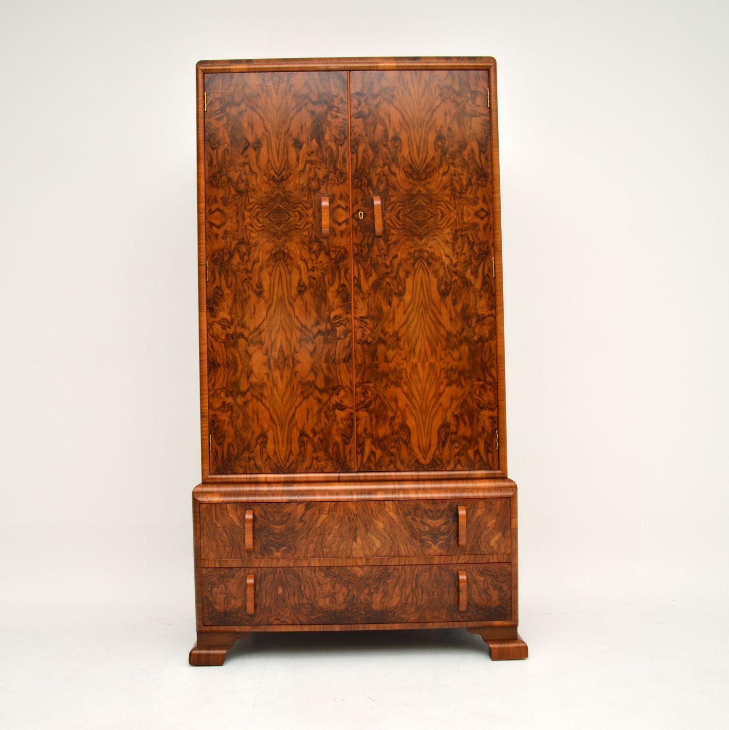 An excellent original Art Deco period wardrobe on chest, beautifully made from burr walnut. This was made in England, it dates from the 1930’s.

The quality is amazing, and this is a very useful size with lots of storage space. The upper cabinet