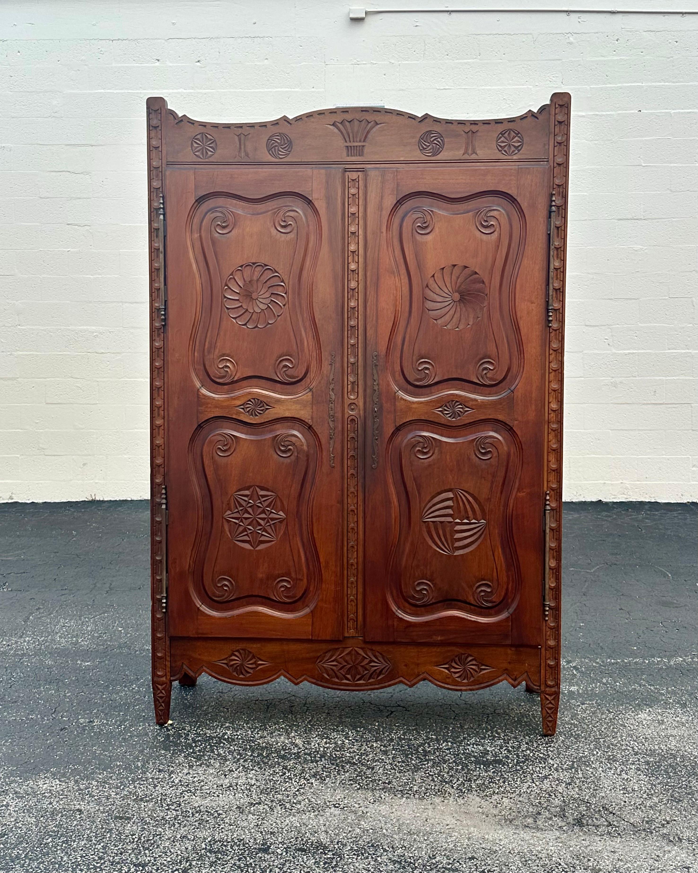 On offer on this occasion is one of the most stunning and rare, Art Deco bar cabinet armoire you could hope to find. Outstanding design is exhibited throughout. The beautiful cabinet is statement piece and packed with personality!! Just look at the