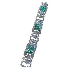 1930's Art Deco Chaumet Platinum Diamond and Carved Emerald Bracelet