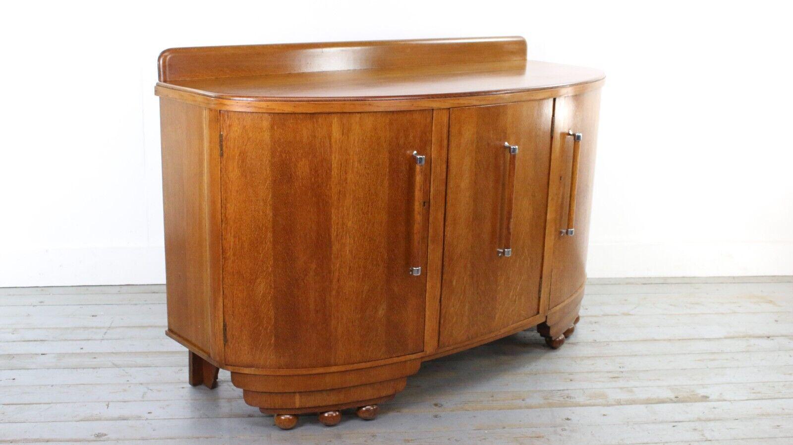 A scarce early g plan cocktail cabinet/sideboard stamped with an early 1930s E Gomme (G Plan) label. Made in the UK in a typical 30s style that is reminiscent of the era.

We have found little about this model and have never seen one before. A