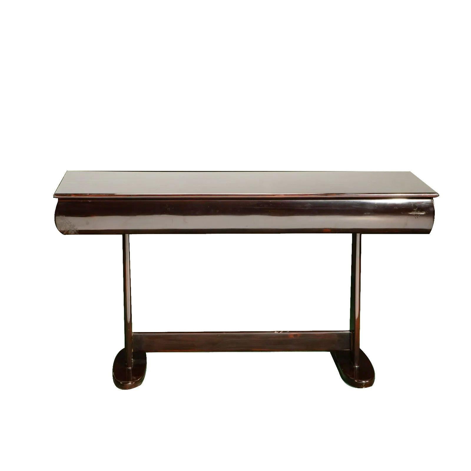 Art Deco Console Table, Circa 1930s in the style of Josef Hoffman

Streamline design with high-gloss finish and three drawers with chrome hardware
 
Dimensions

32