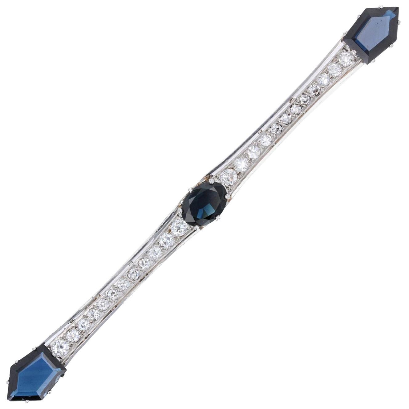 1930s Art Deco Diamond Sapphire 18 Karat White and Yellow Gold Bar Brooch For Sale