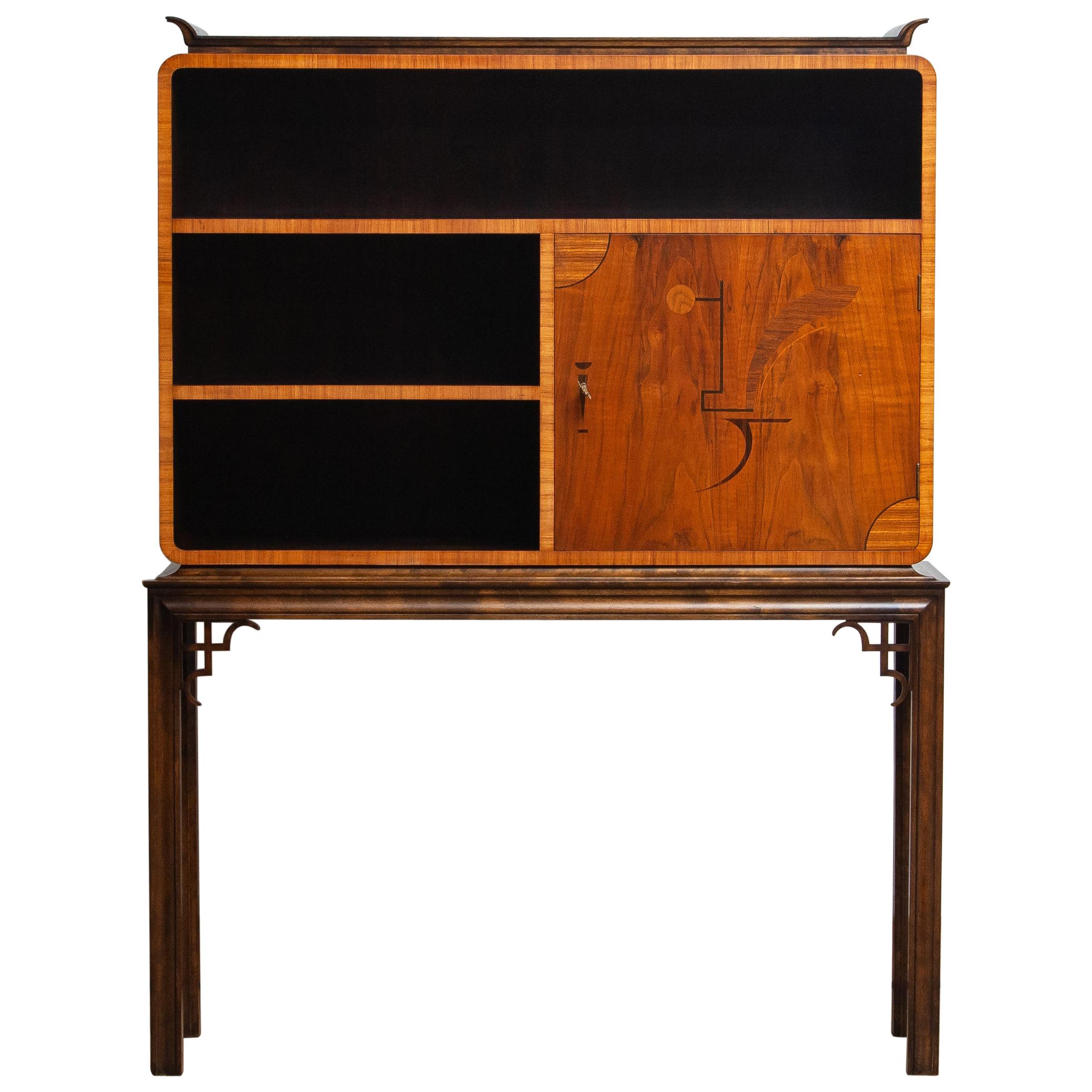 1930s, unique and extremely beautiful Art Deco masterpiece designed in Sweden which with Hindu influences and accents to 
good material and emotional prosperity!

The secrétaire is veneered with flamed beech (sides and inside). The door is