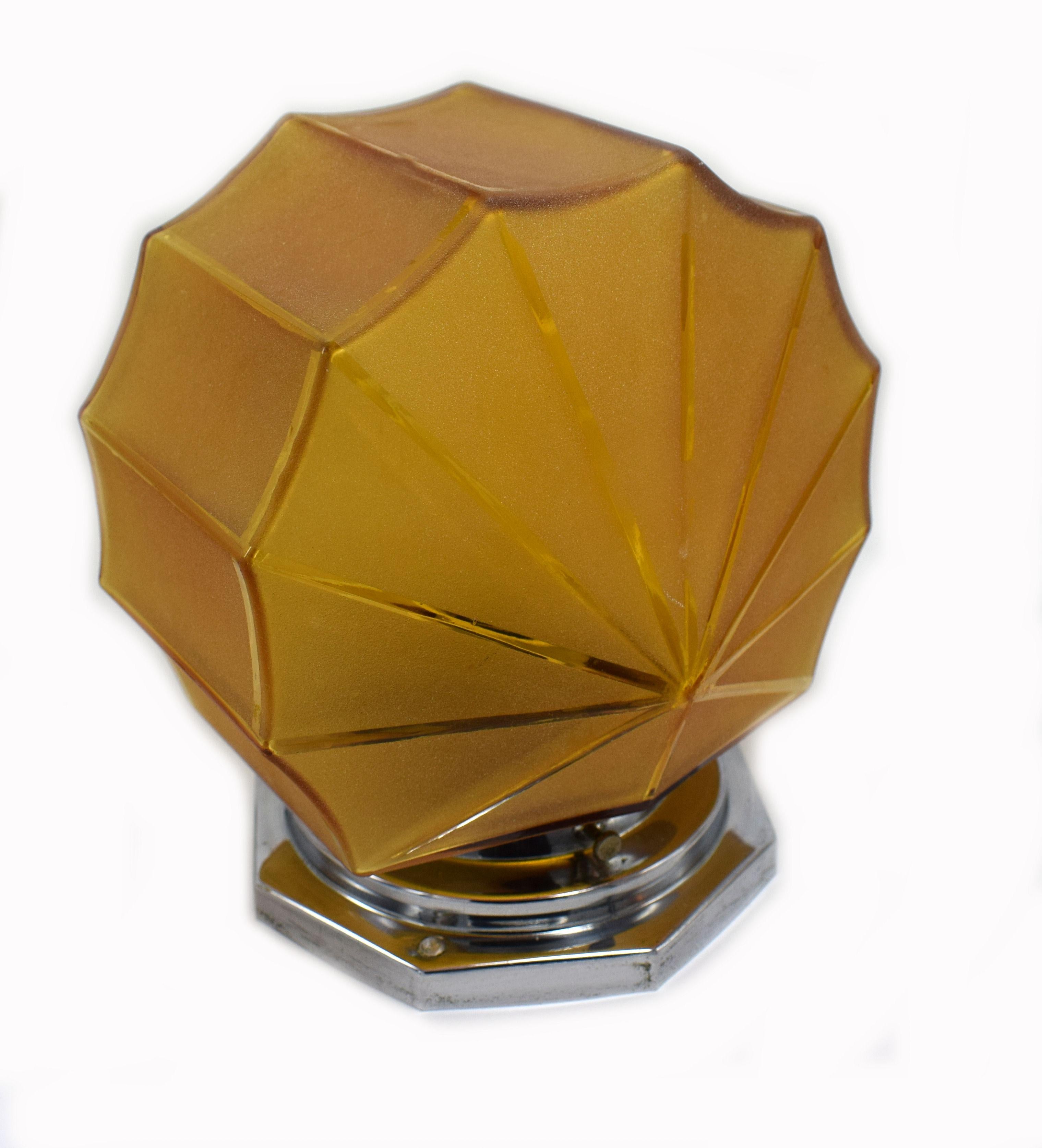 Fabulous 1930s Art Deco ceiling light that sits flush to the ceiling. Wonderful design that can't be mistaken for any other era, segmented panels that together give a fan shape with slightly scolloped edges. The glass is a sepia tone and slightly
