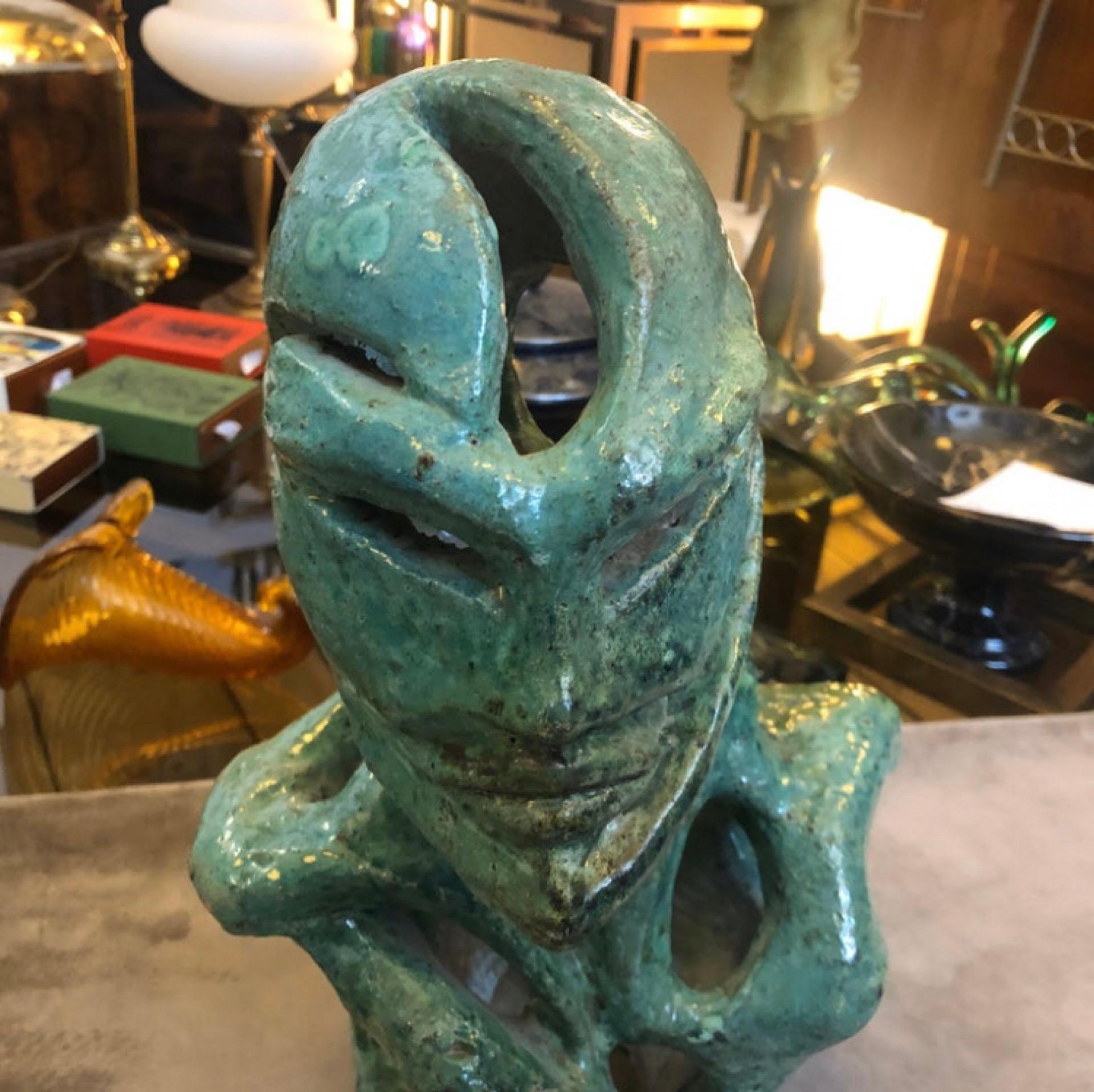 A unique piece Futurist green ceramic figure, made in Italy in the 1930s. It's signed Sofia and it's in good conditions overall. The Bust Sculpture is a beautiful and unique piece of Italian art that reflects the Futurist movement of the early 20th