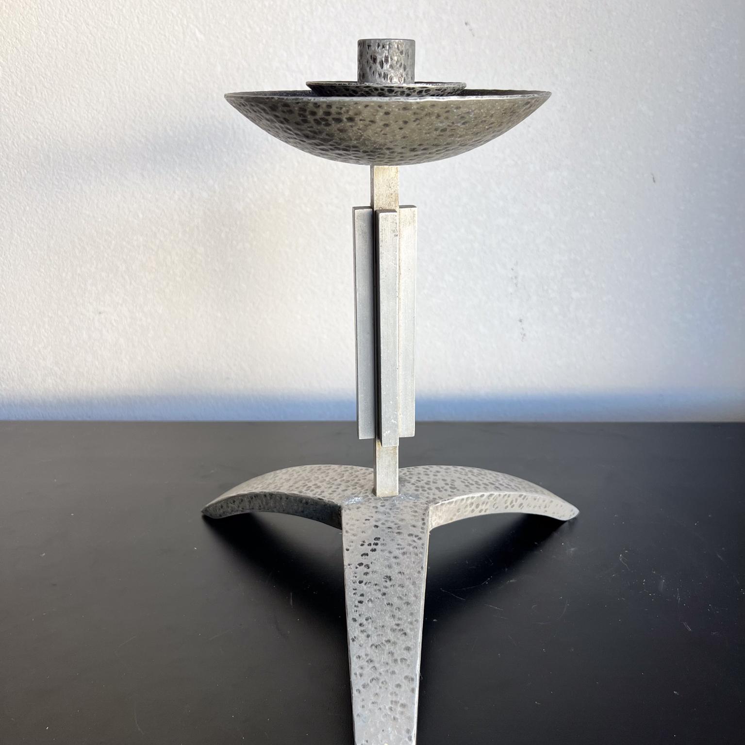 1930s Art Deco inspired Candle Holder Tripod Base
11.5 h x 9.5 diameter
made of aluminum
unmarked
Preowned vintage condition
Refer to images provided.