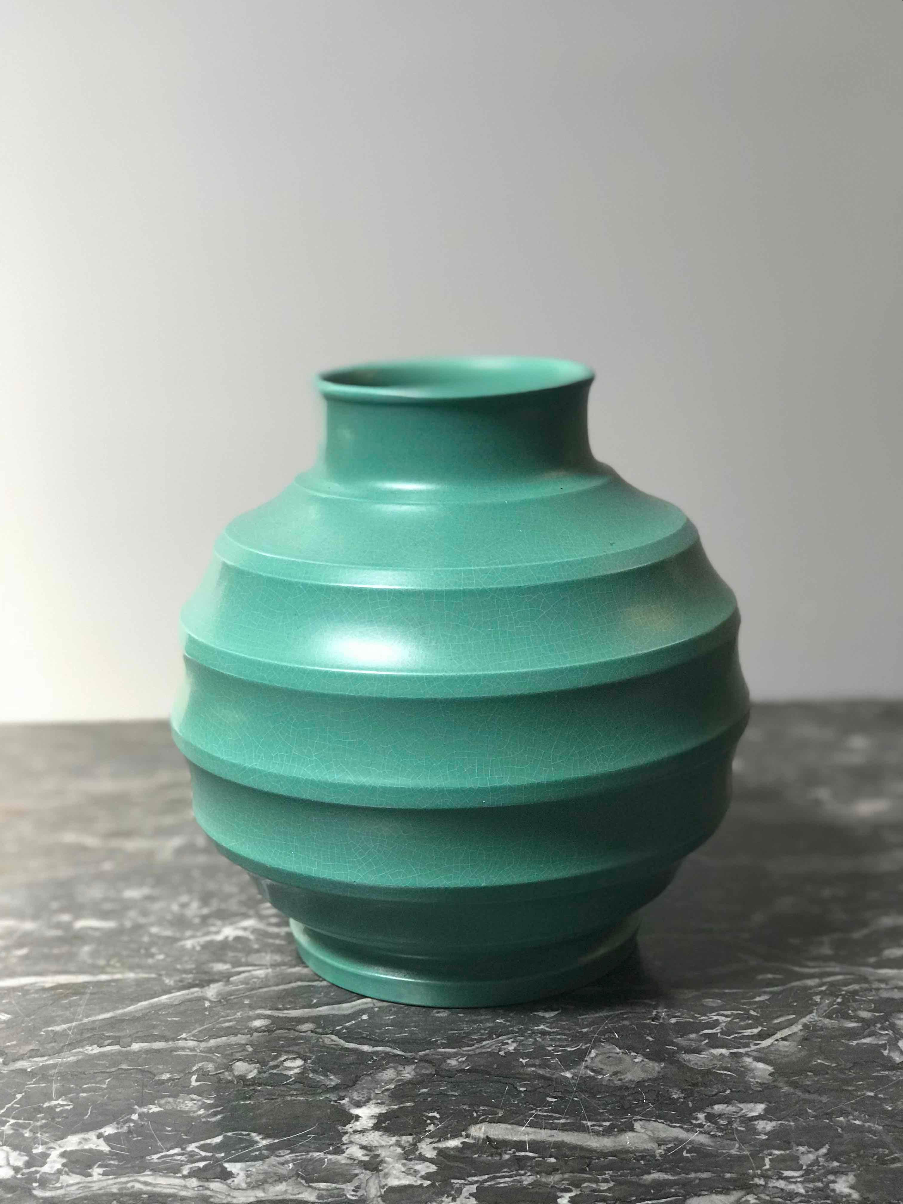 1930s art deco jade green football vase by Keith Murray for Wedgewood. 