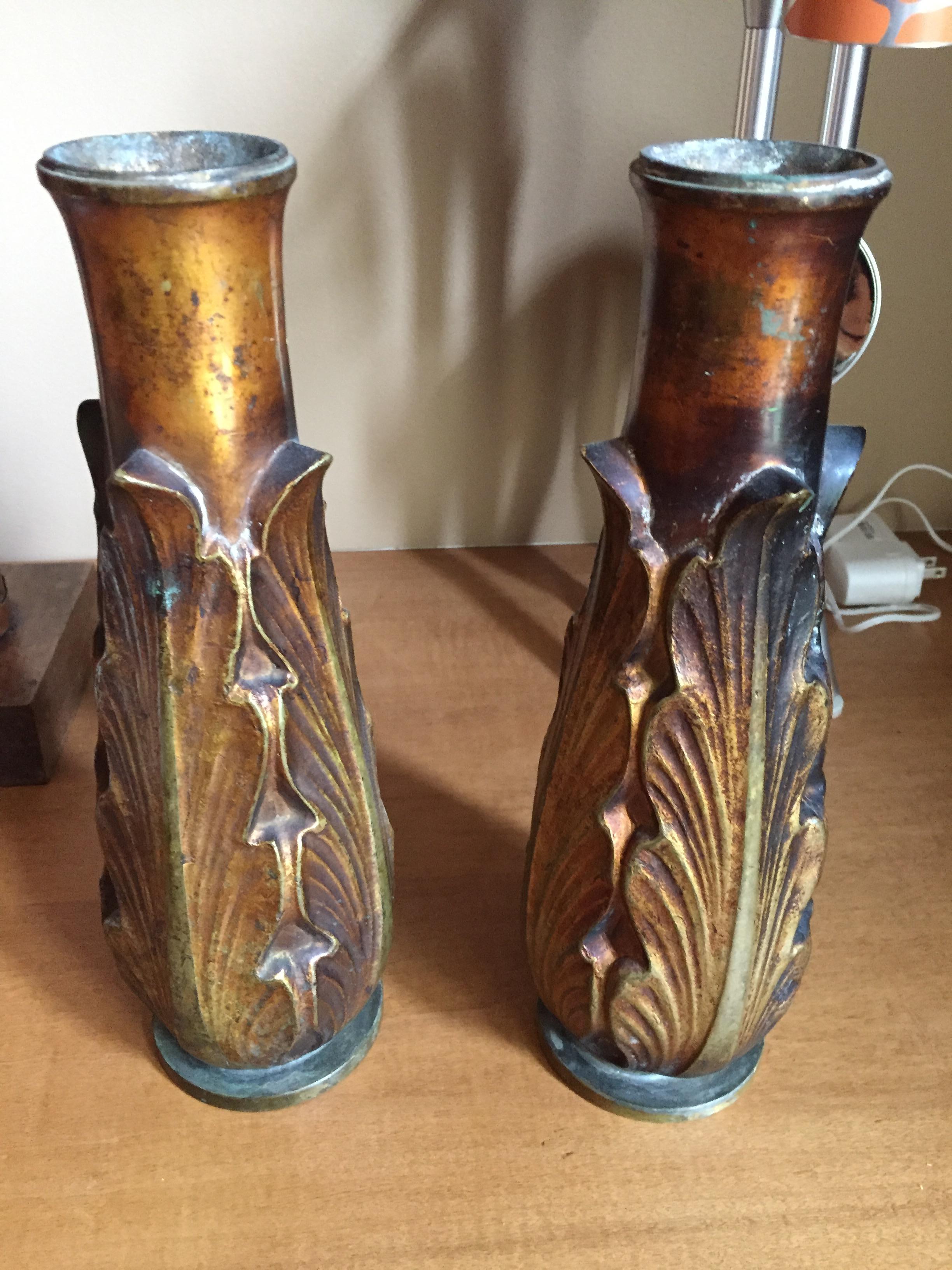Vintage Art Deco bronze
beautiful natural patina
3lbs each; substantial pieces
beautiful leaf pattern
use as a set of vases, or for large candles,
or put on display as the beautiful work of art they are!