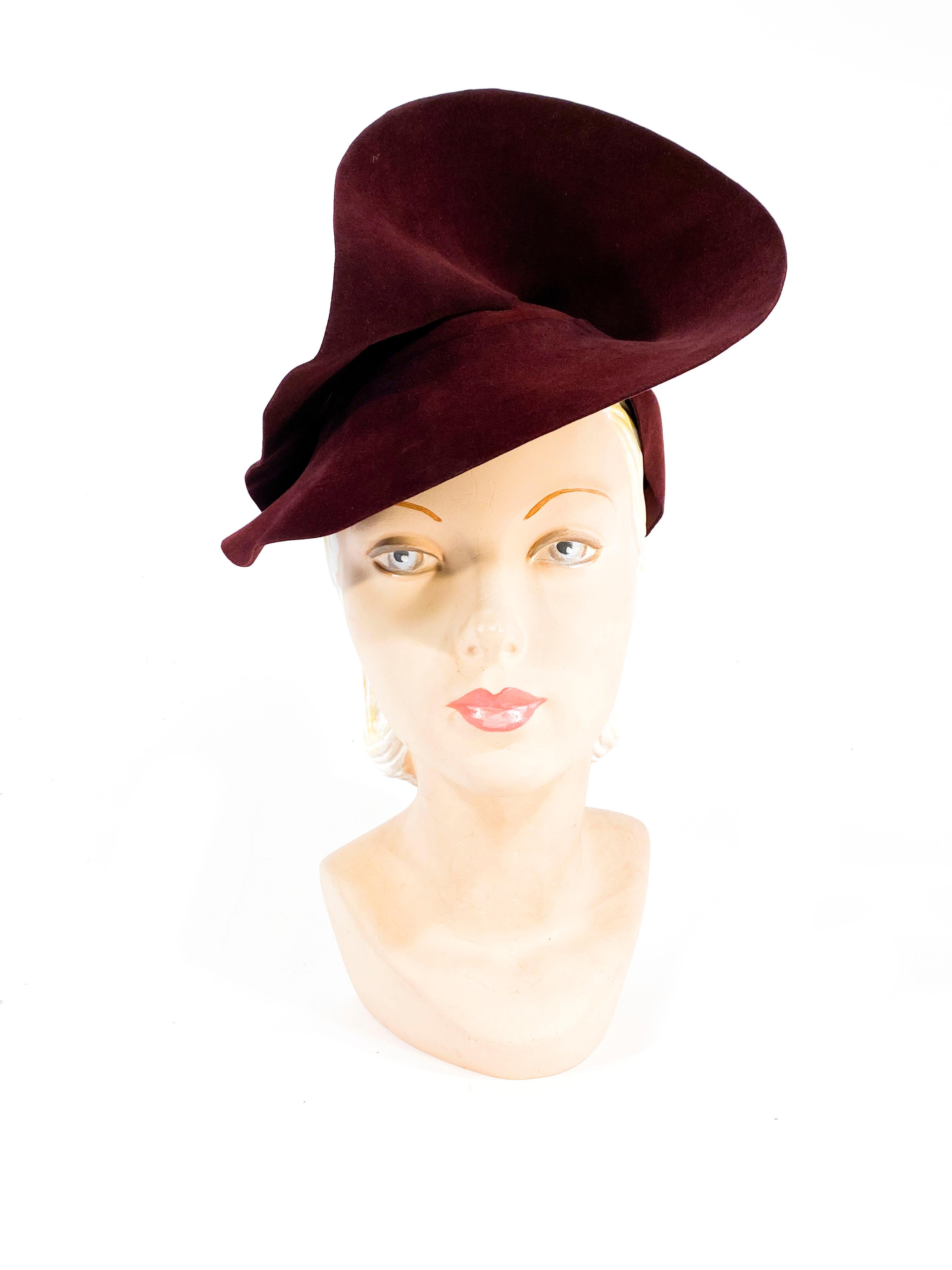 1930s hand sculpted maroon beaver fur felt hat with any symmetrical silhouette. Customer made high fashion hat. 