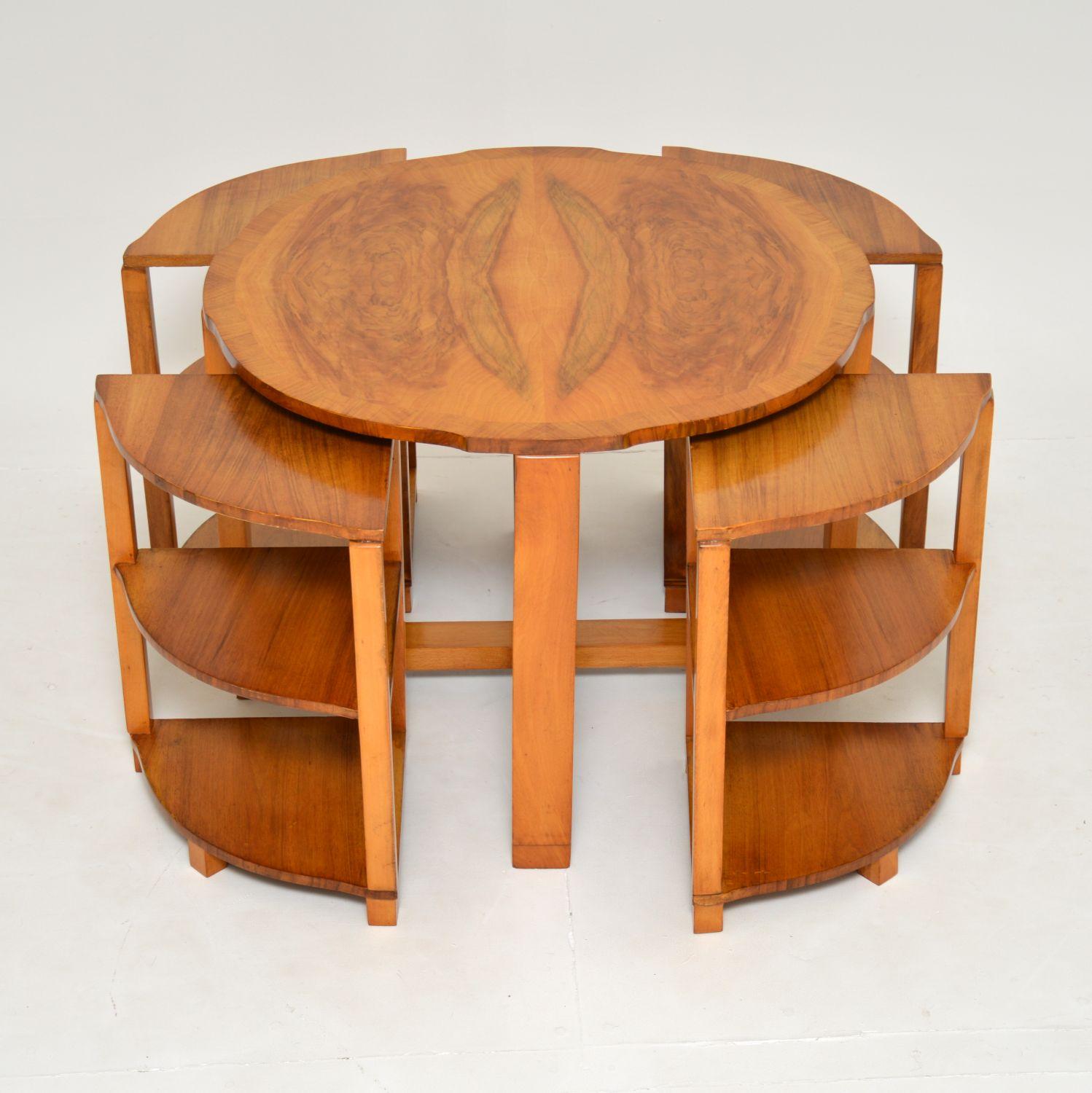 A gorgeous and very well made Art Deco walnut coffee table with four nesting tables. This was made in England, it dates from the 1930’s.

The quality is fantastic, this is beautifully made and is a great size. The walnut has a lovely colour tone