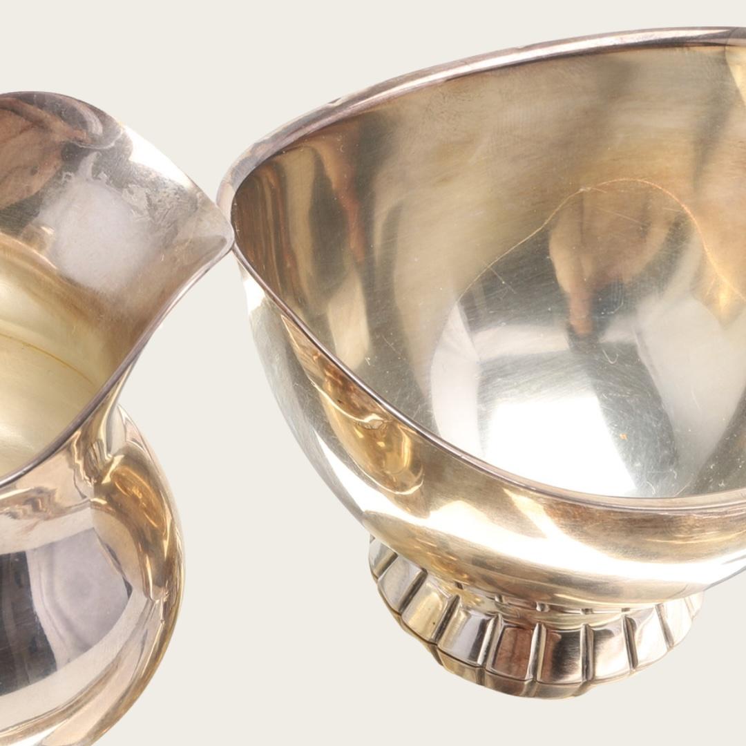 Inconnu 1930s Art Deco Nickel Silver Three Piece Sugar Bowl, Milk Verser and Tray en vente