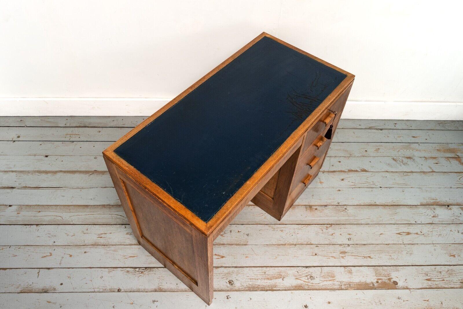 1930s Art Deco Oak Heals Four Drawer Desk with Leather Top In Good Condition For Sale In STOKE ON TRENT, GB