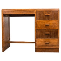 1930s Art Deco Oak Heals Four Drawer Desk with Leather Top