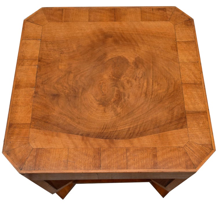 Fabulous and original 1930s Art Deco walnut coffee/ occasional table. Perfect for modern day use either as a coffee table or center table. The veneers are an absolute delight with figuring on every angle, both tiers boast highly figured and very