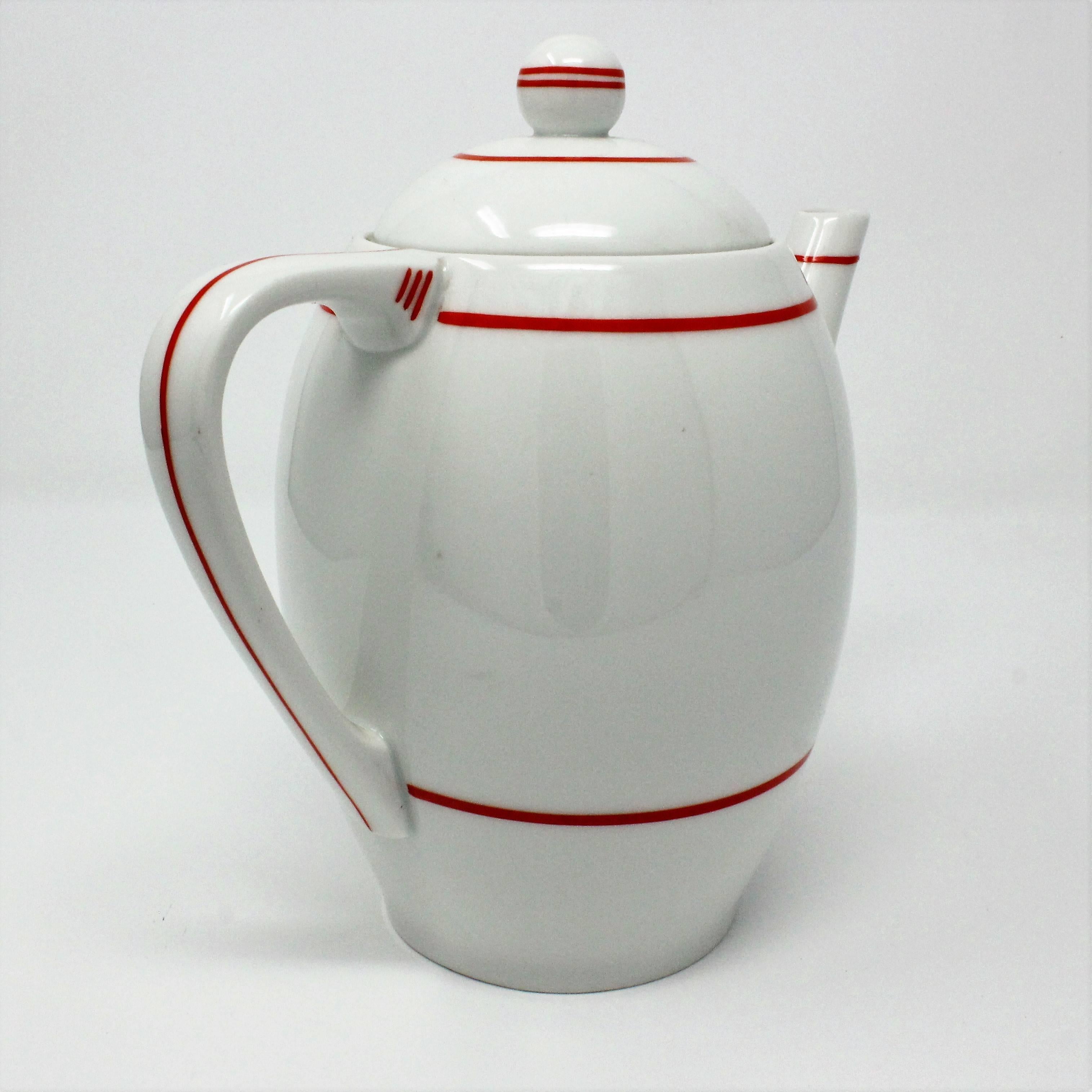 1930s Czechoslovakian Art Deco porcelain teapot by Haas & Czjzek of Chodau. The teapot features a red stripe detail and is in near-perfect condition.
